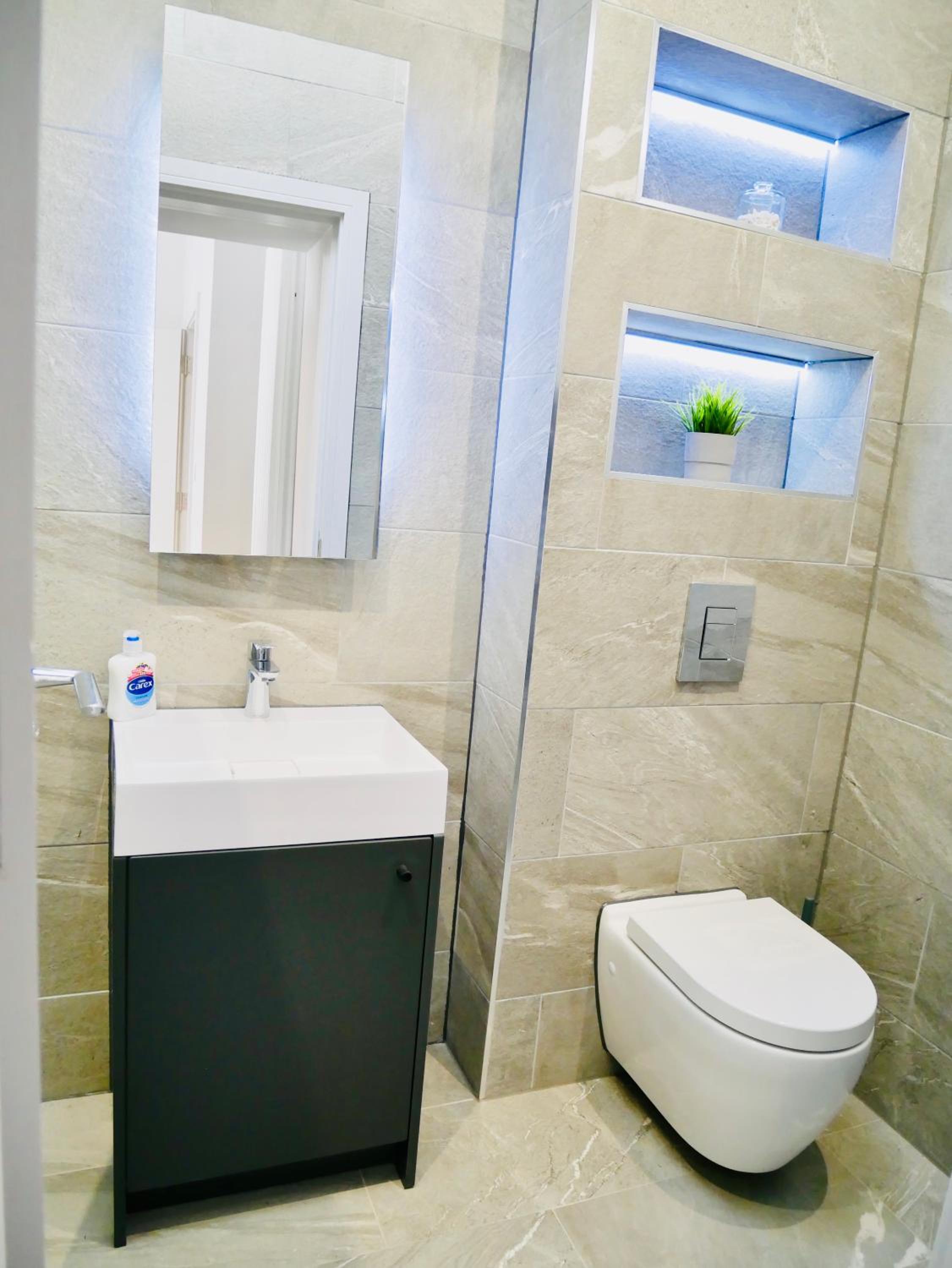 Three-Bedroom Apartment - Photo 2