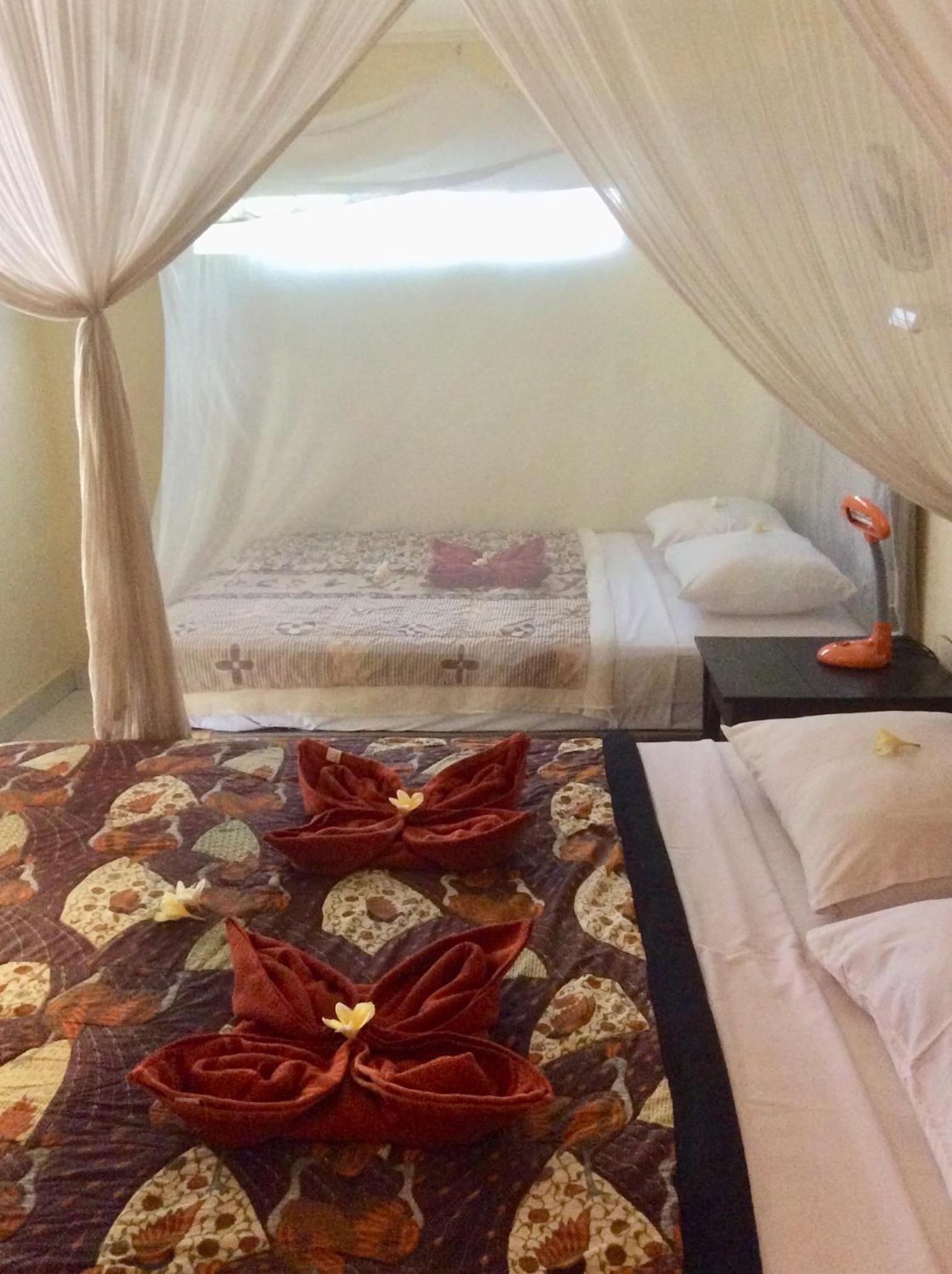 Quadruple Room - Photo 9