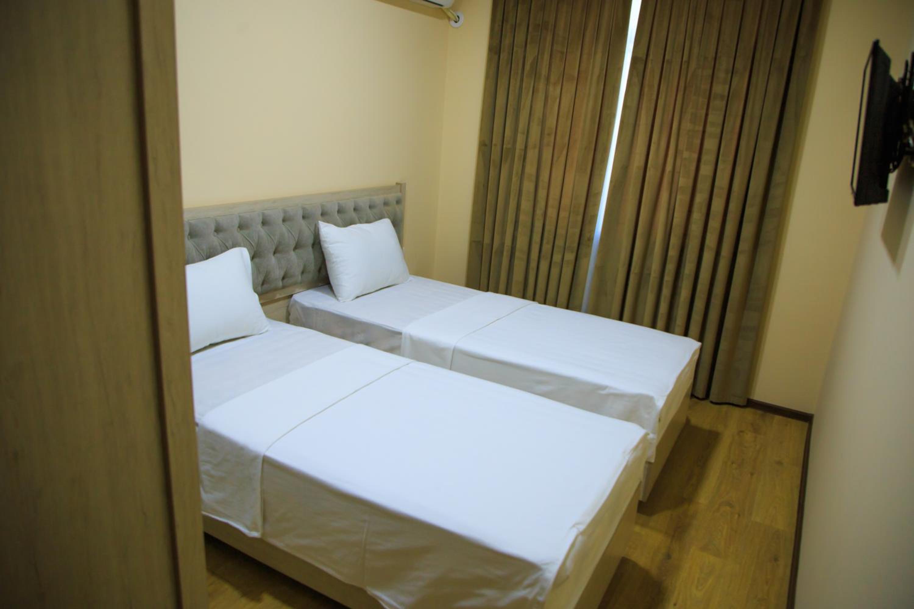 Standard Twin Room - Photo 1