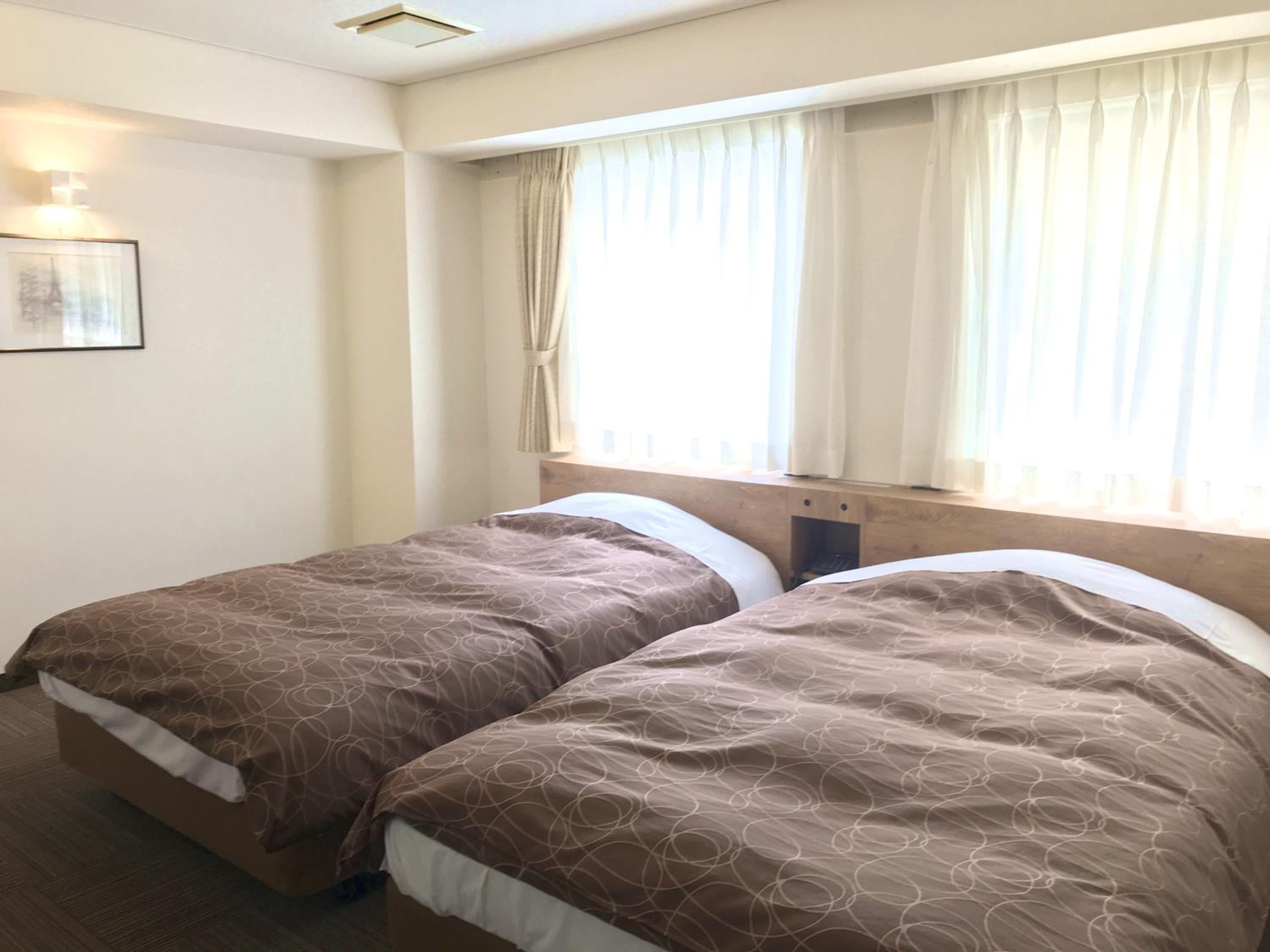 Twin Room - Non-Smoking - Photo 1