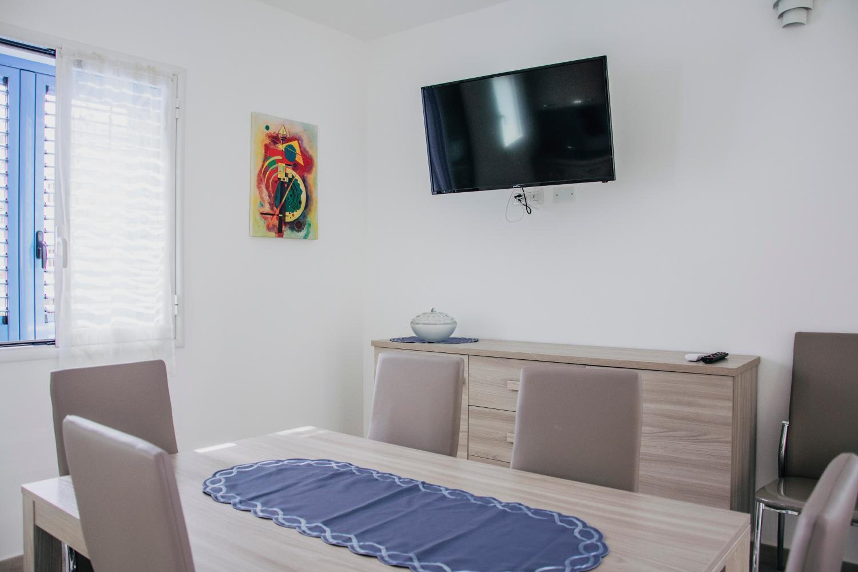 Three-Bedroom Apartment - Photo 25