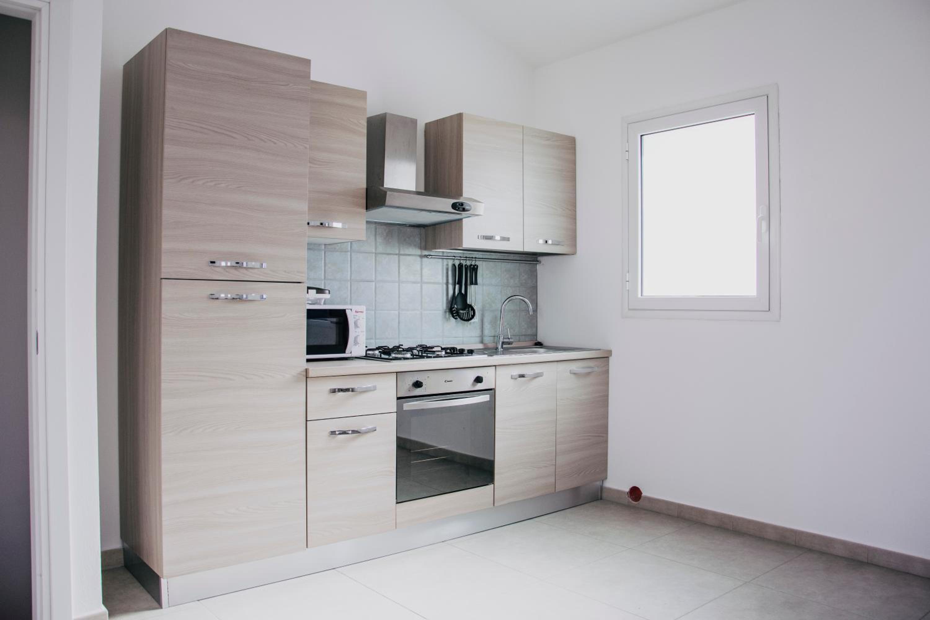 Three-Bedroom Apartment - Photo 37