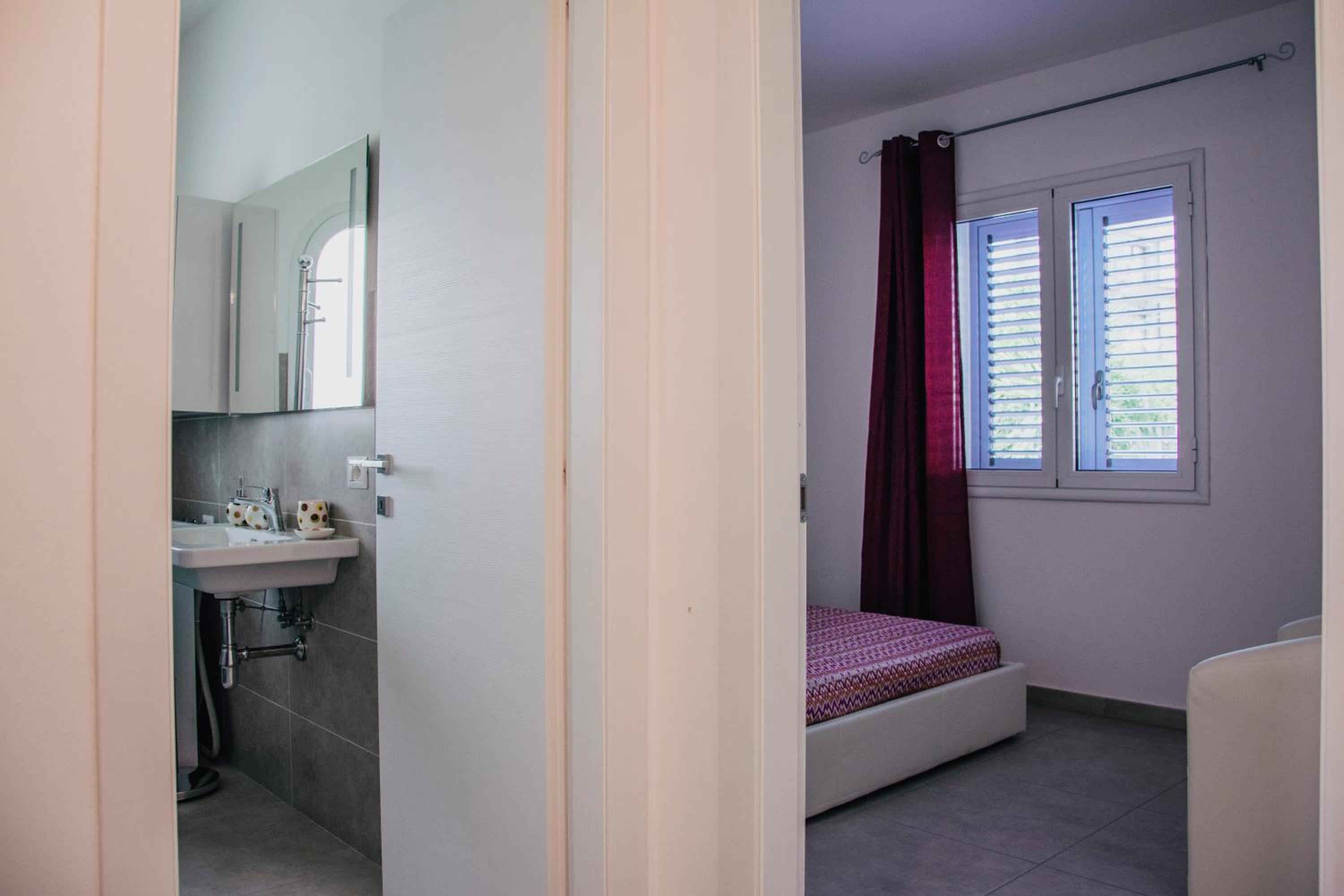 Three-Bedroom Apartment - Photo 41