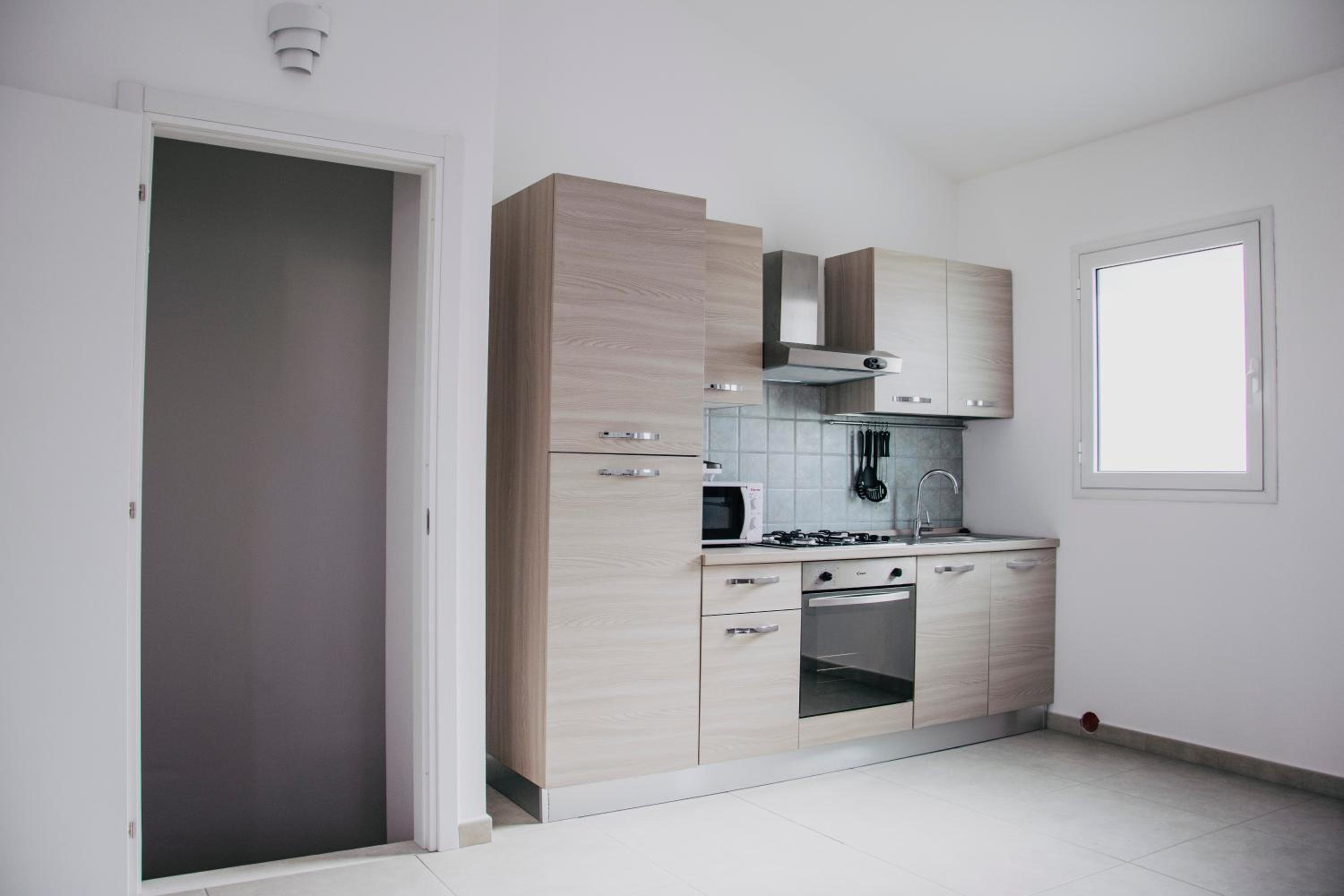 Three-Bedroom Apartment - Photo 42