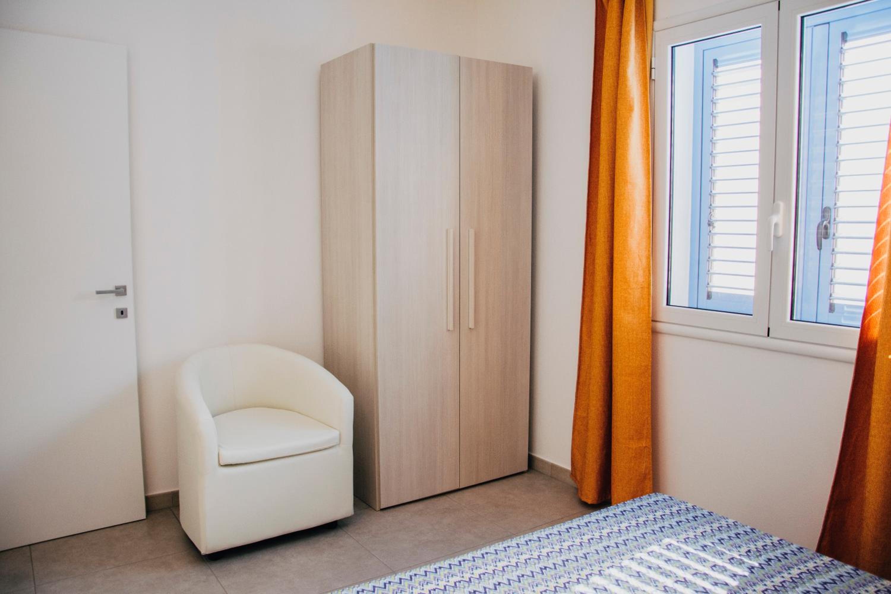 Three-Bedroom Apartment - Photo 43