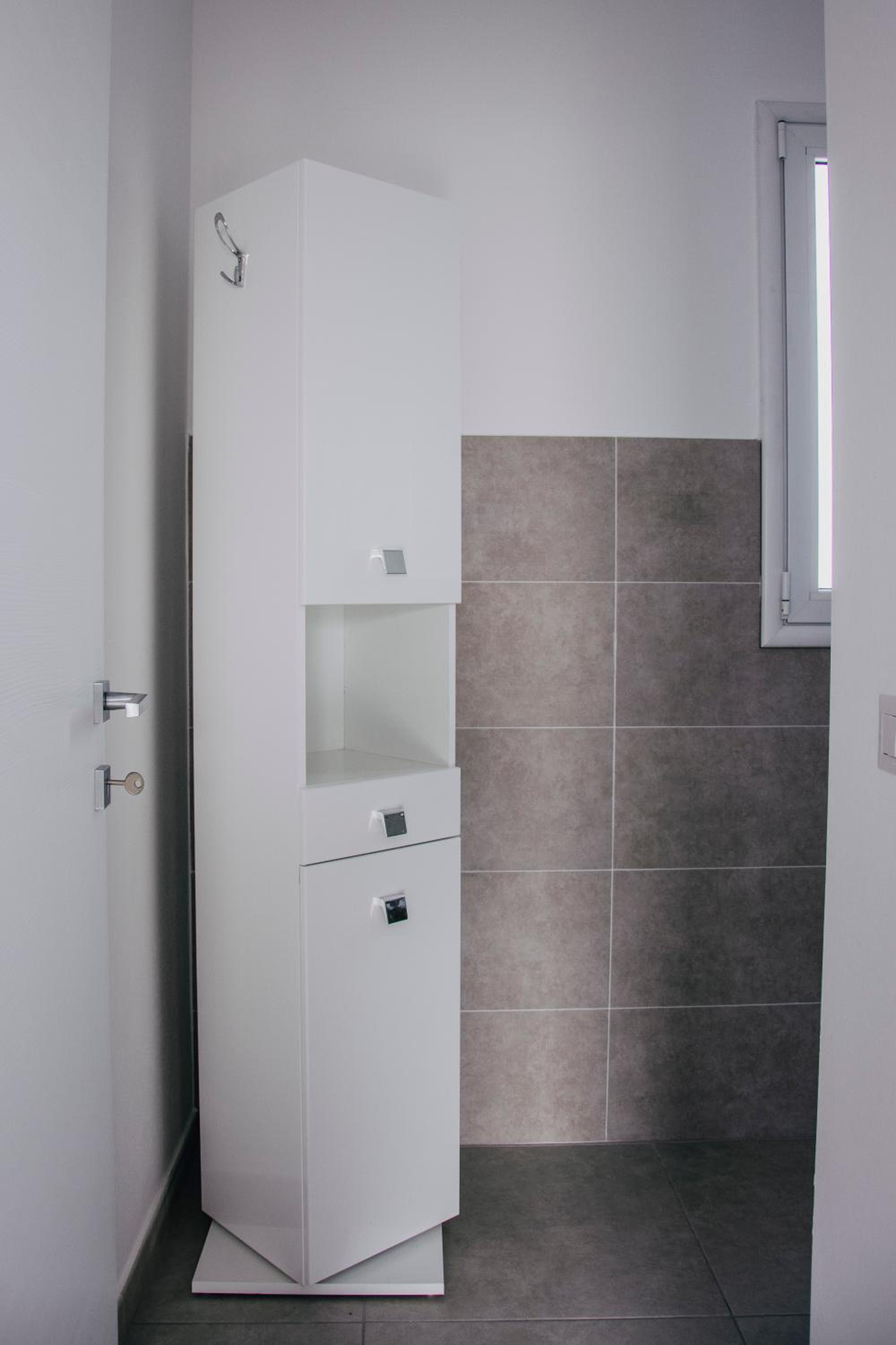 Three-Bedroom Apartment - Photo 45