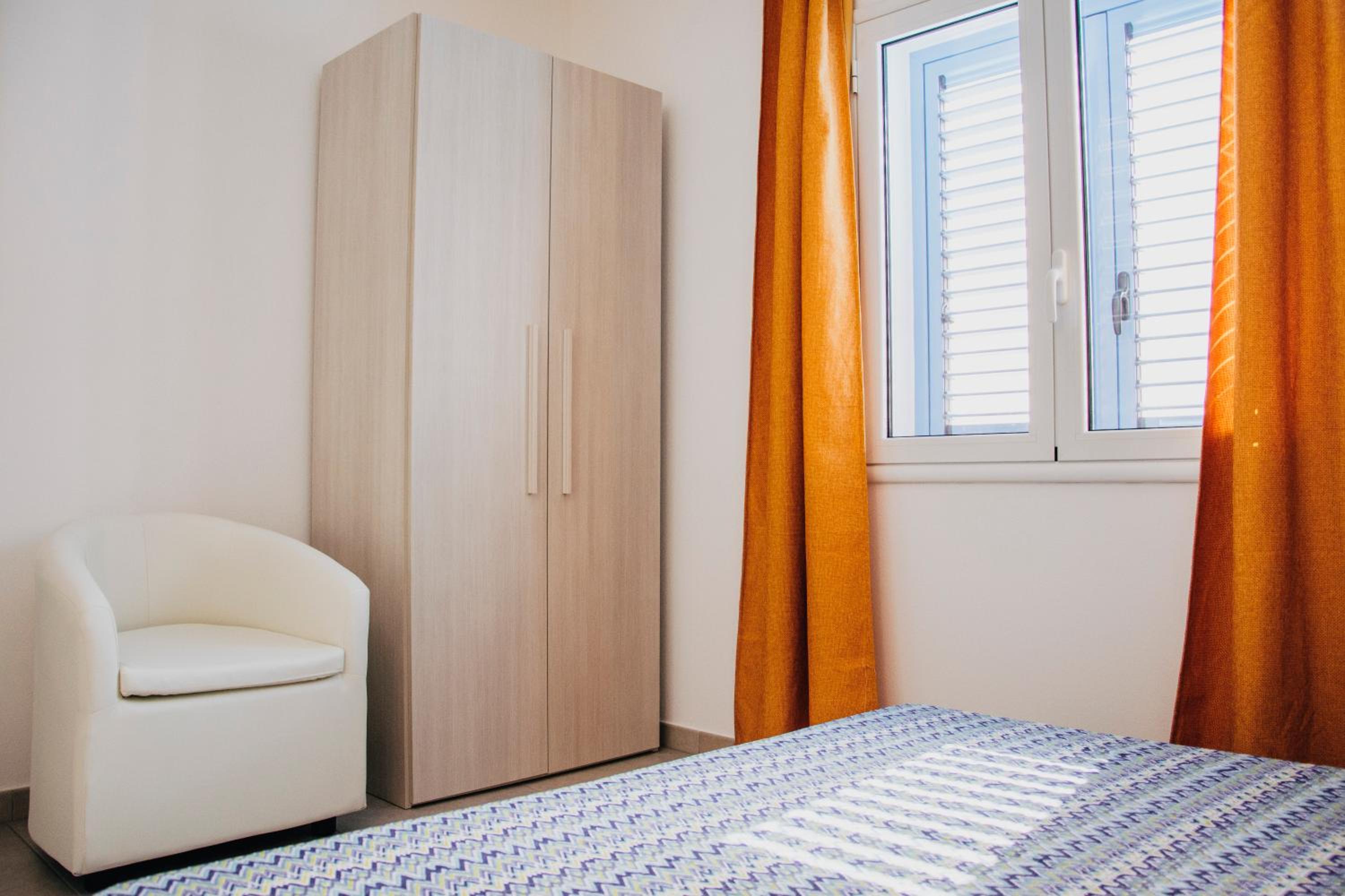 Three-Bedroom Apartment - Photo 48