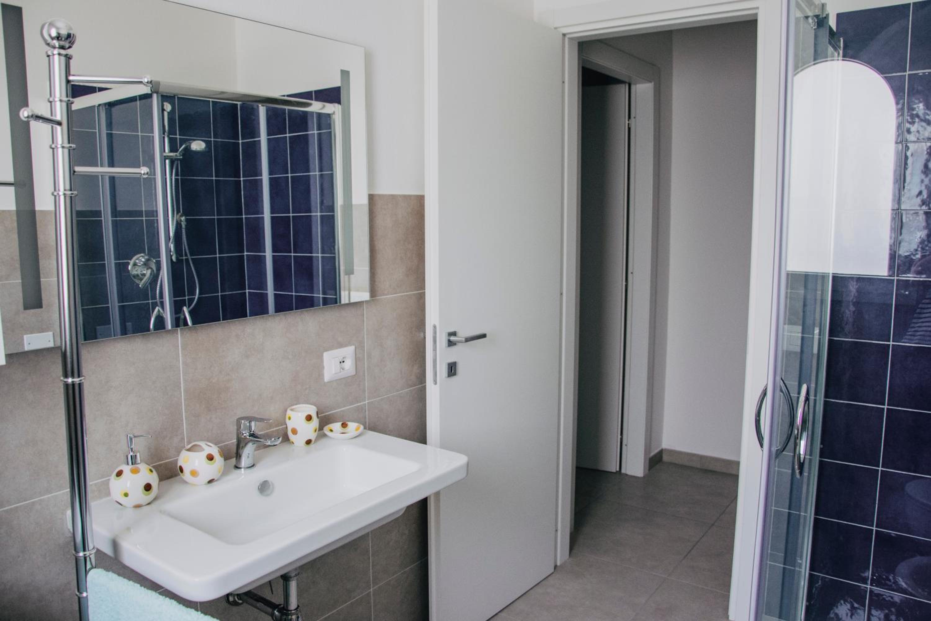 Three-Bedroom Apartment - Photo 64