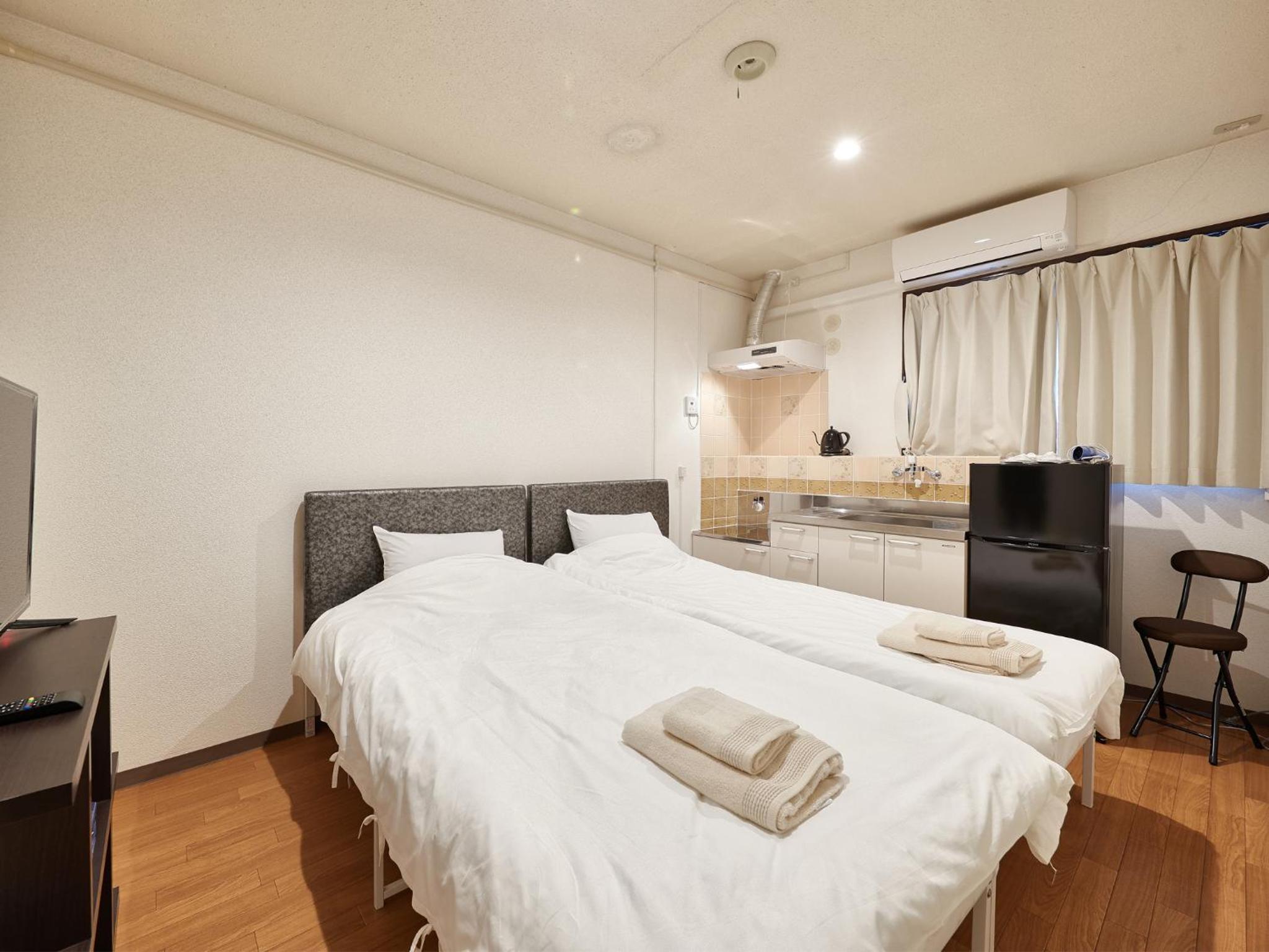 Twin Room - Photo 15