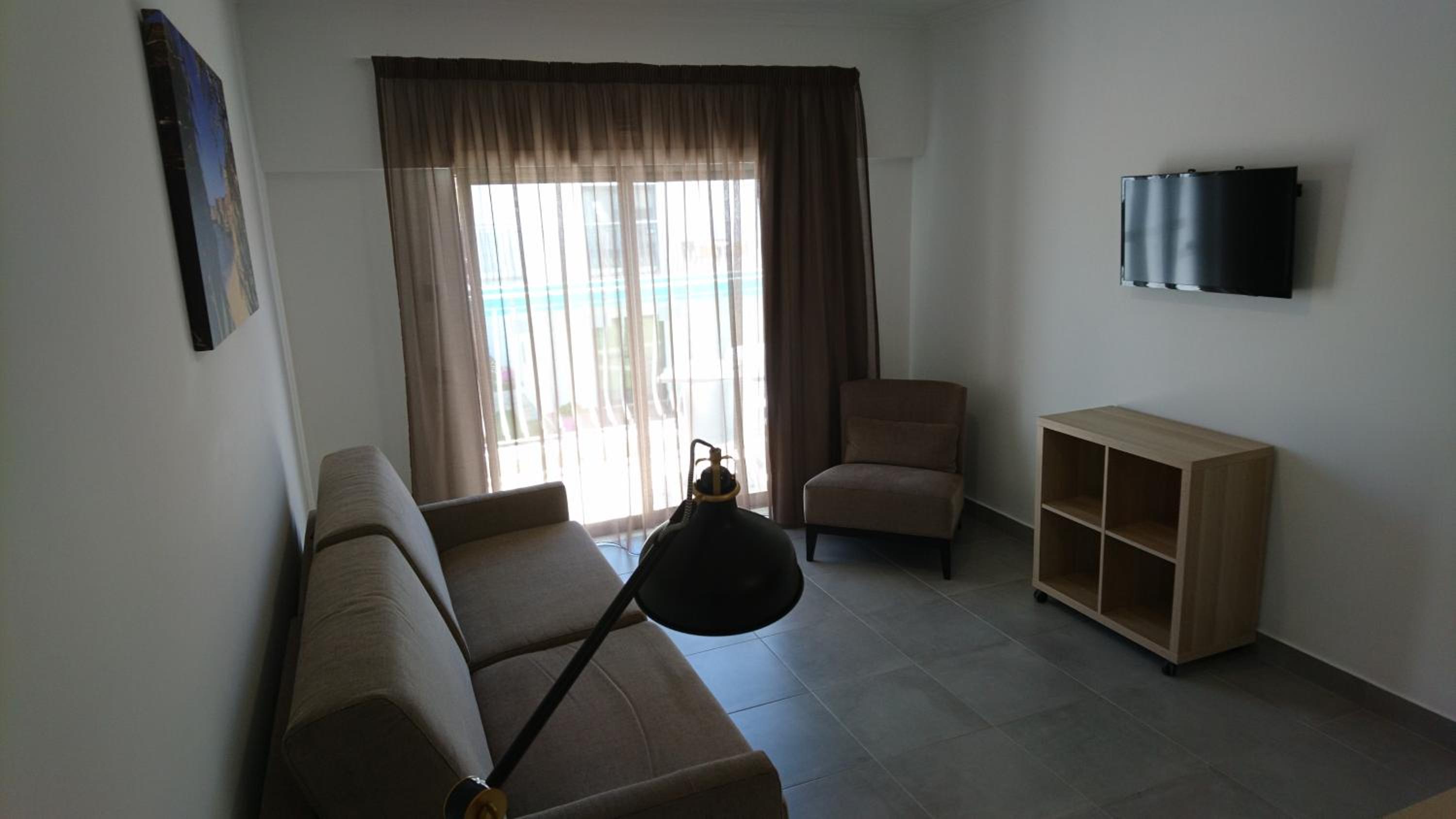Three-Bedroom Apartment photo 2