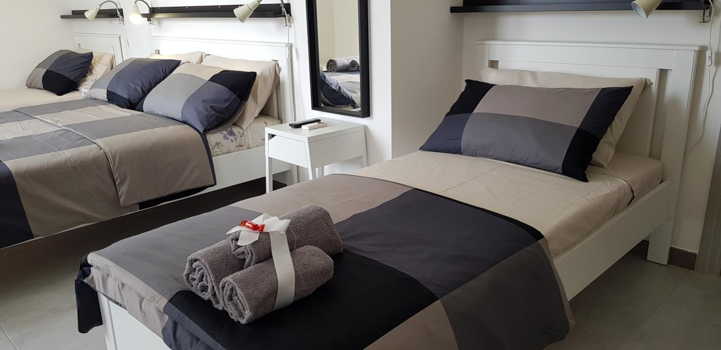 Deluxe Quadruple Room - Photo 8