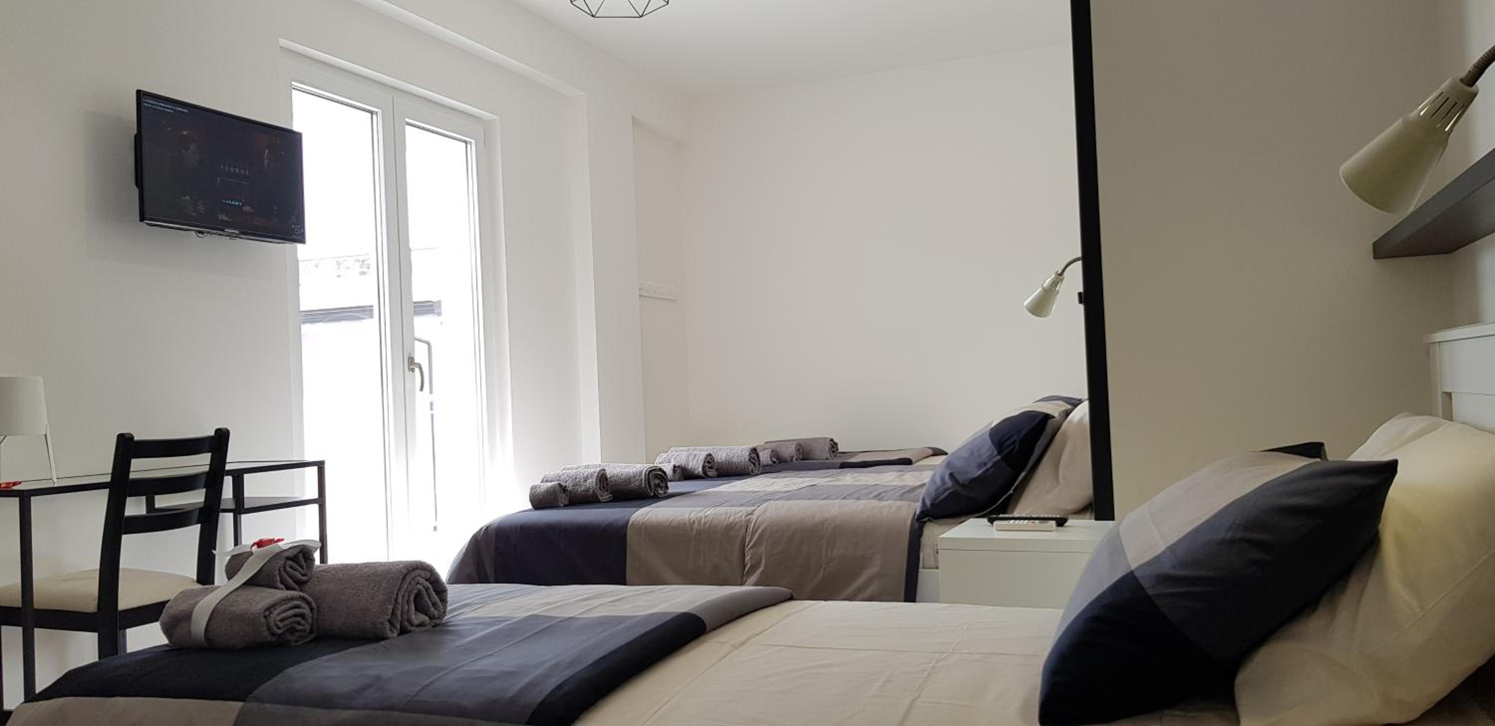 Deluxe Quadruple Room - Photo 12