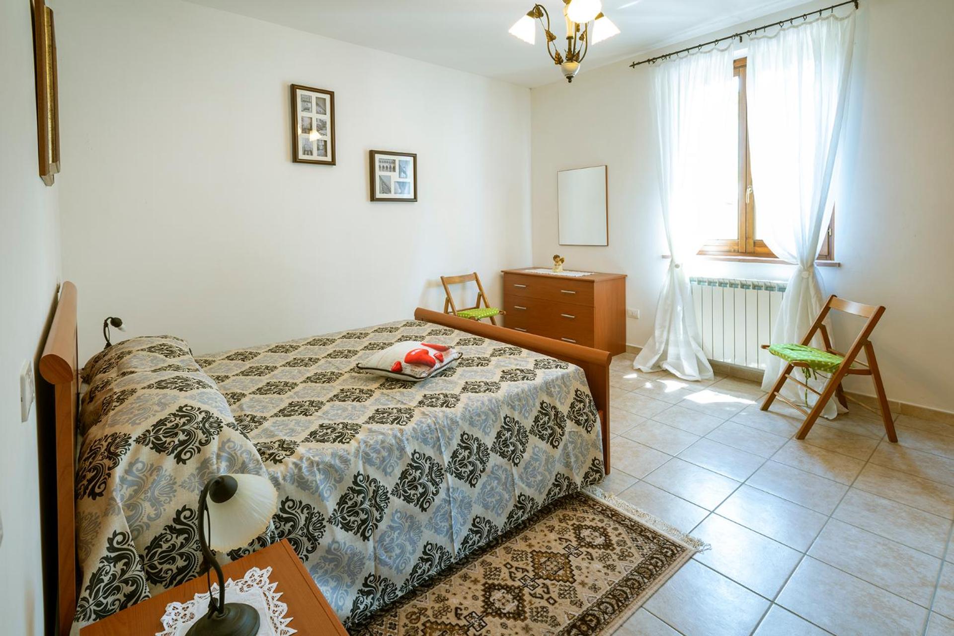 Three-Bedroom Apartment - Photo 18