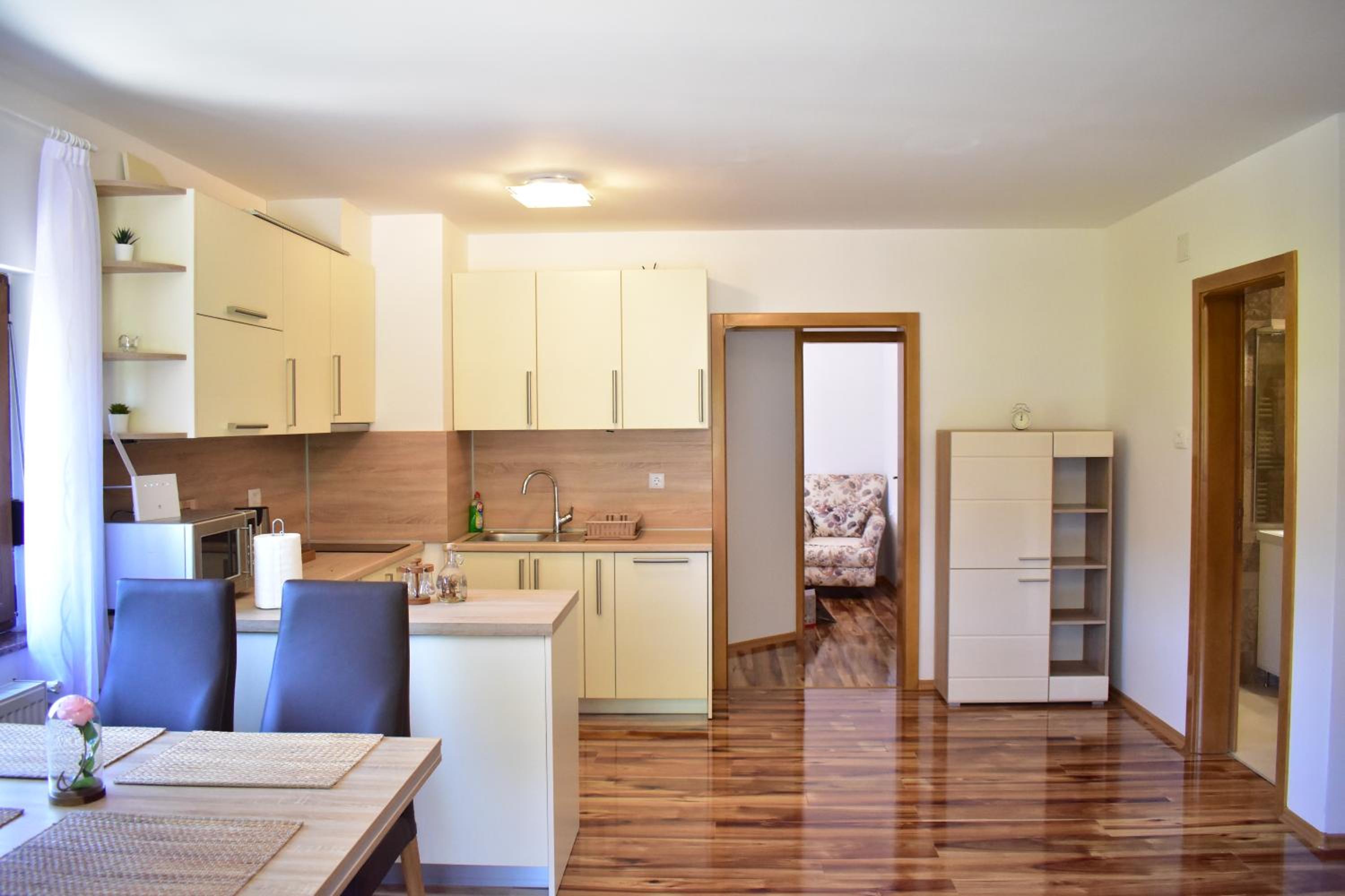 Apartment with Balcony - Photo 11