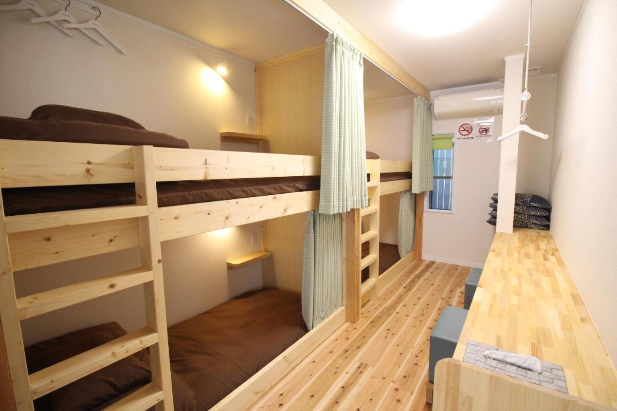 Bunk Bed in Male Dormitory Room with Shared Bathroom photo 1