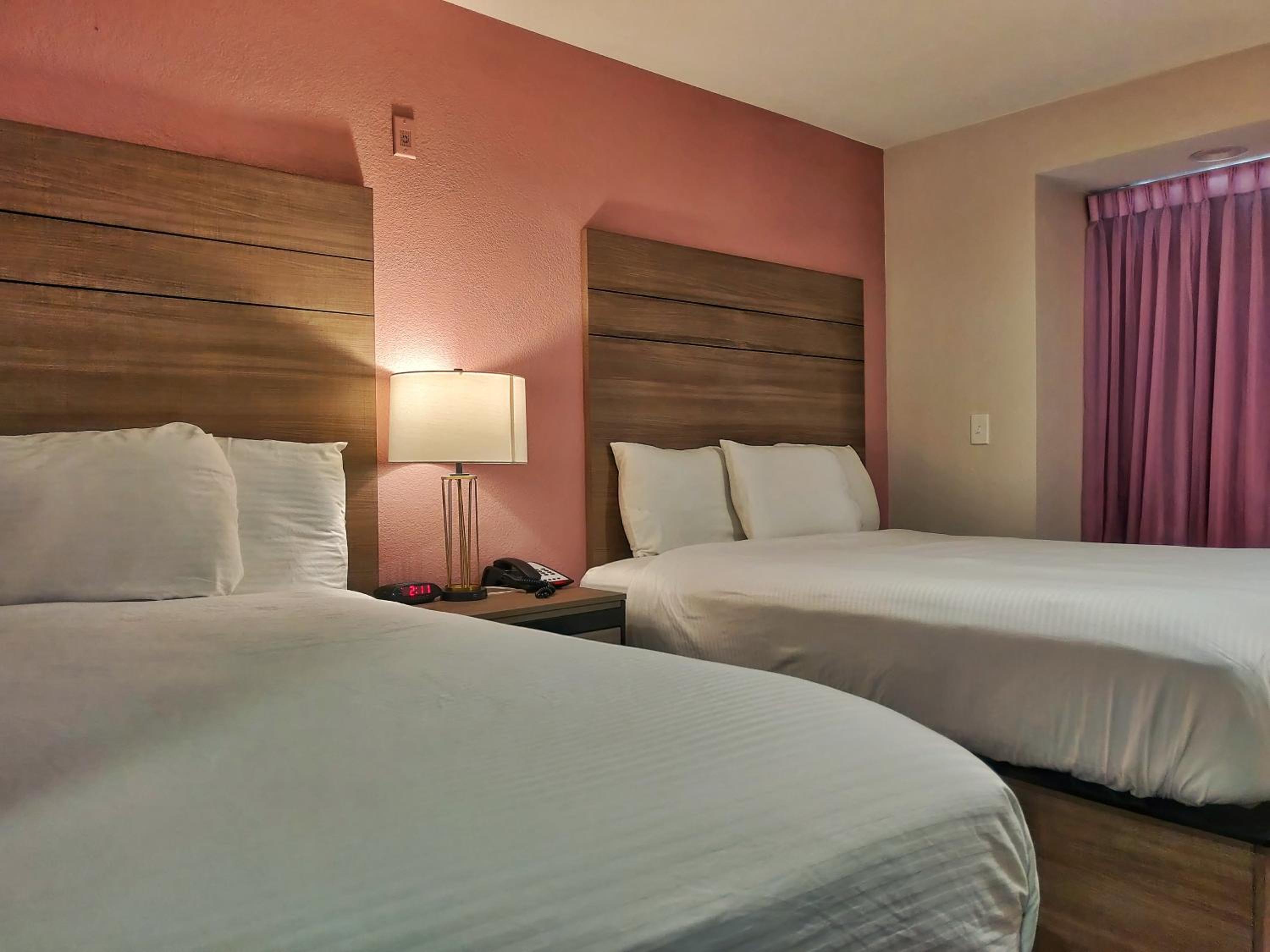 Queen Room with Two Queen Beds - Photo 1