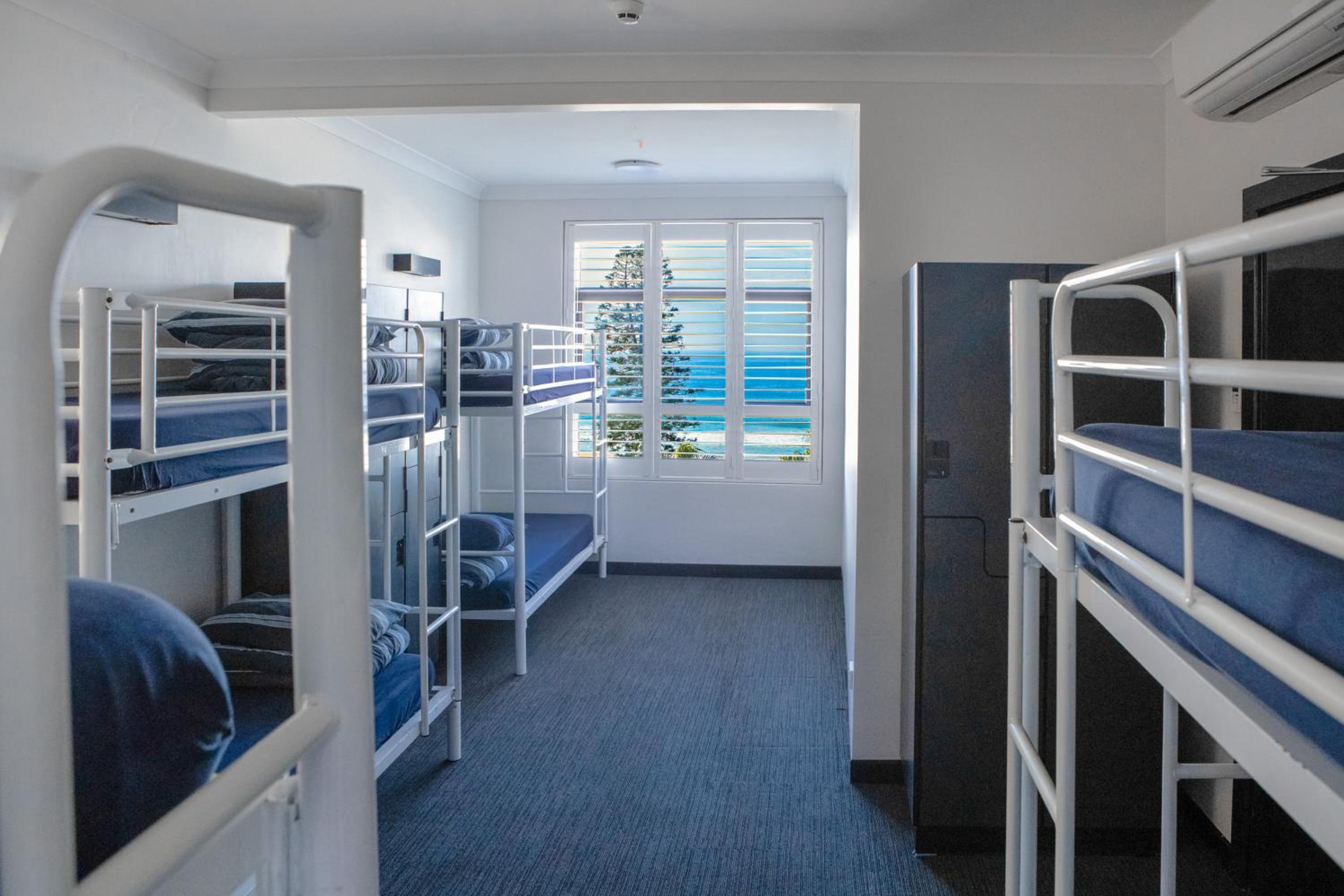 Bed in 8-Bed Mixed Dormitory Room with Beach View and Shared Bathroom photo 1