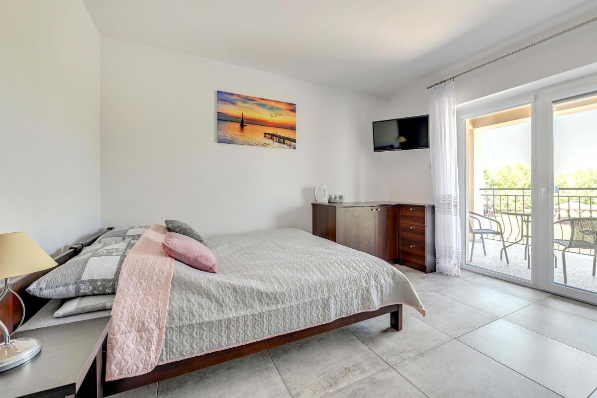 Quadruple Room with Balcony photo 1