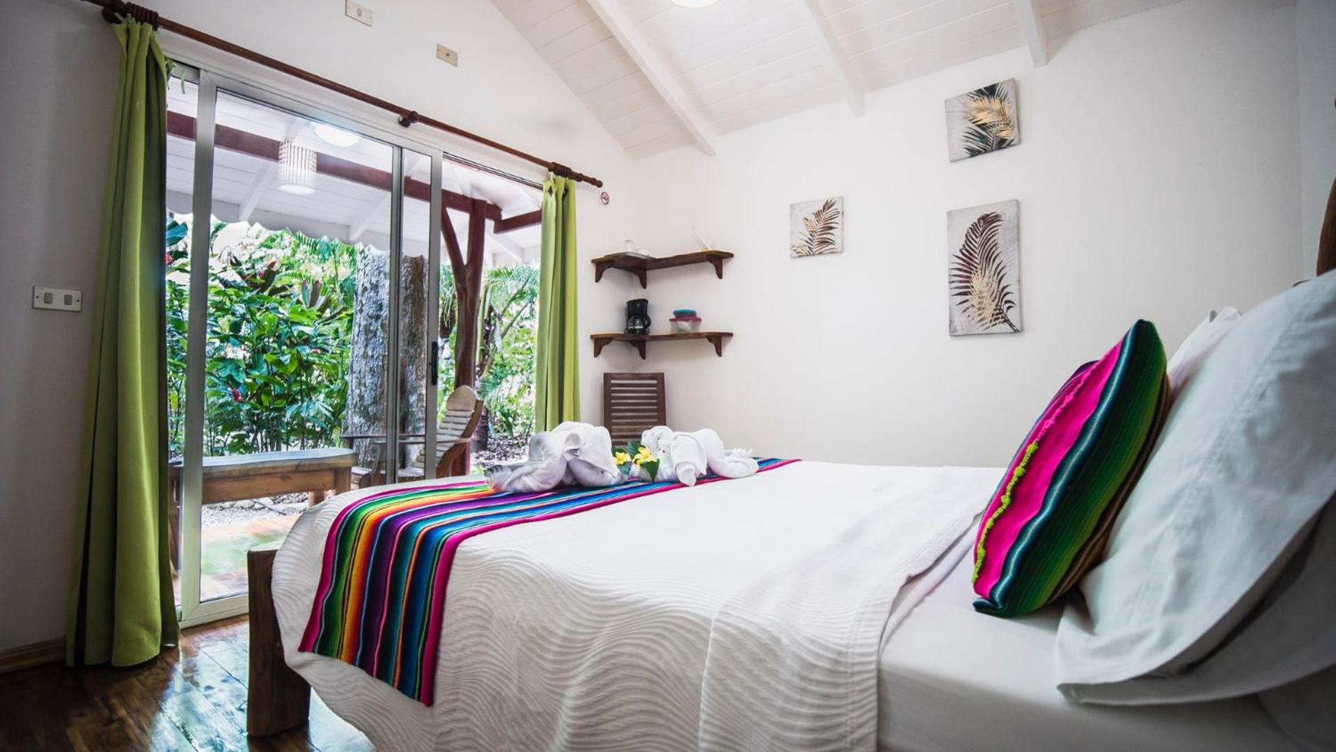Bungalow con cama queen size