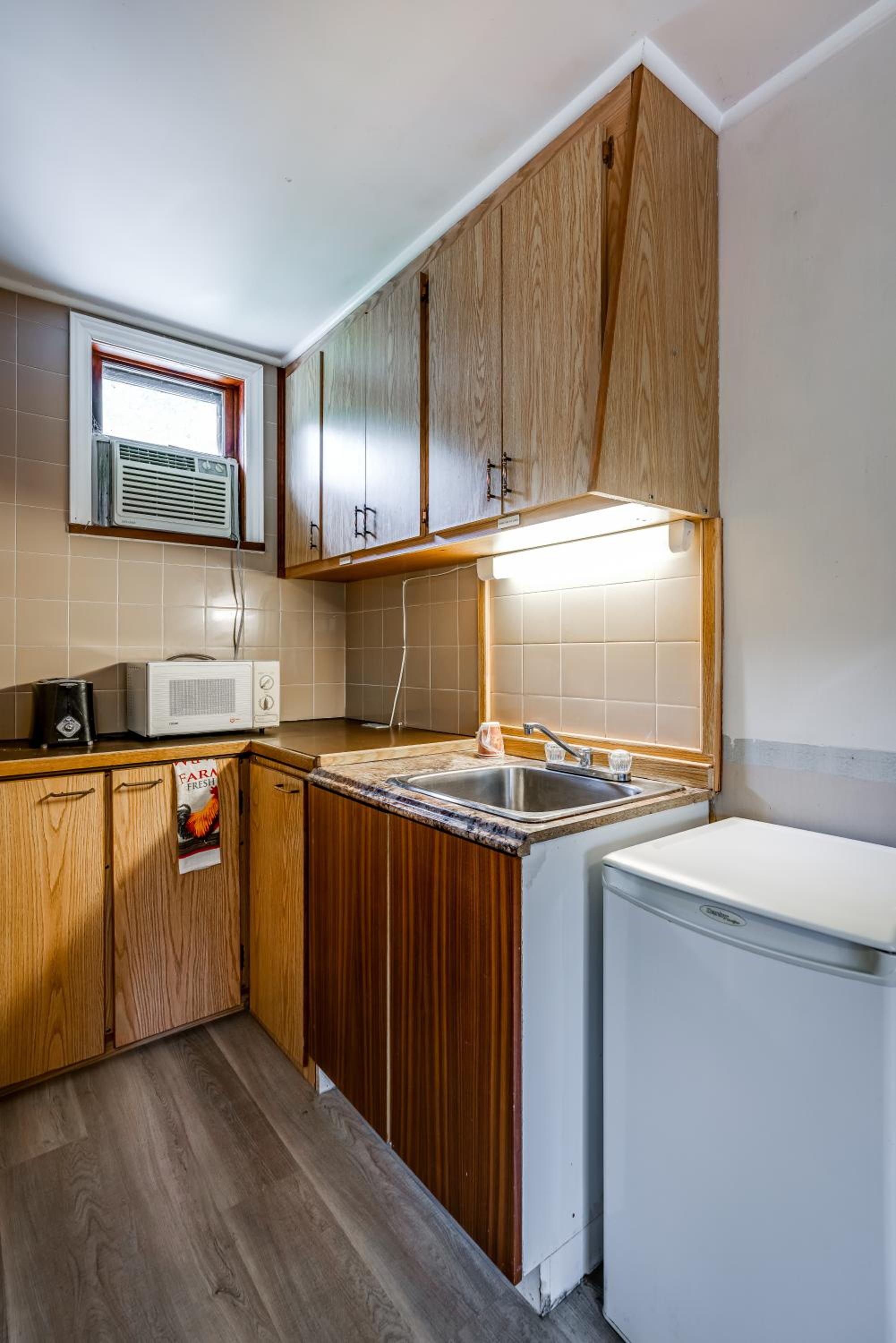 Premium Quadruple Room with kitchenette - Photo 7