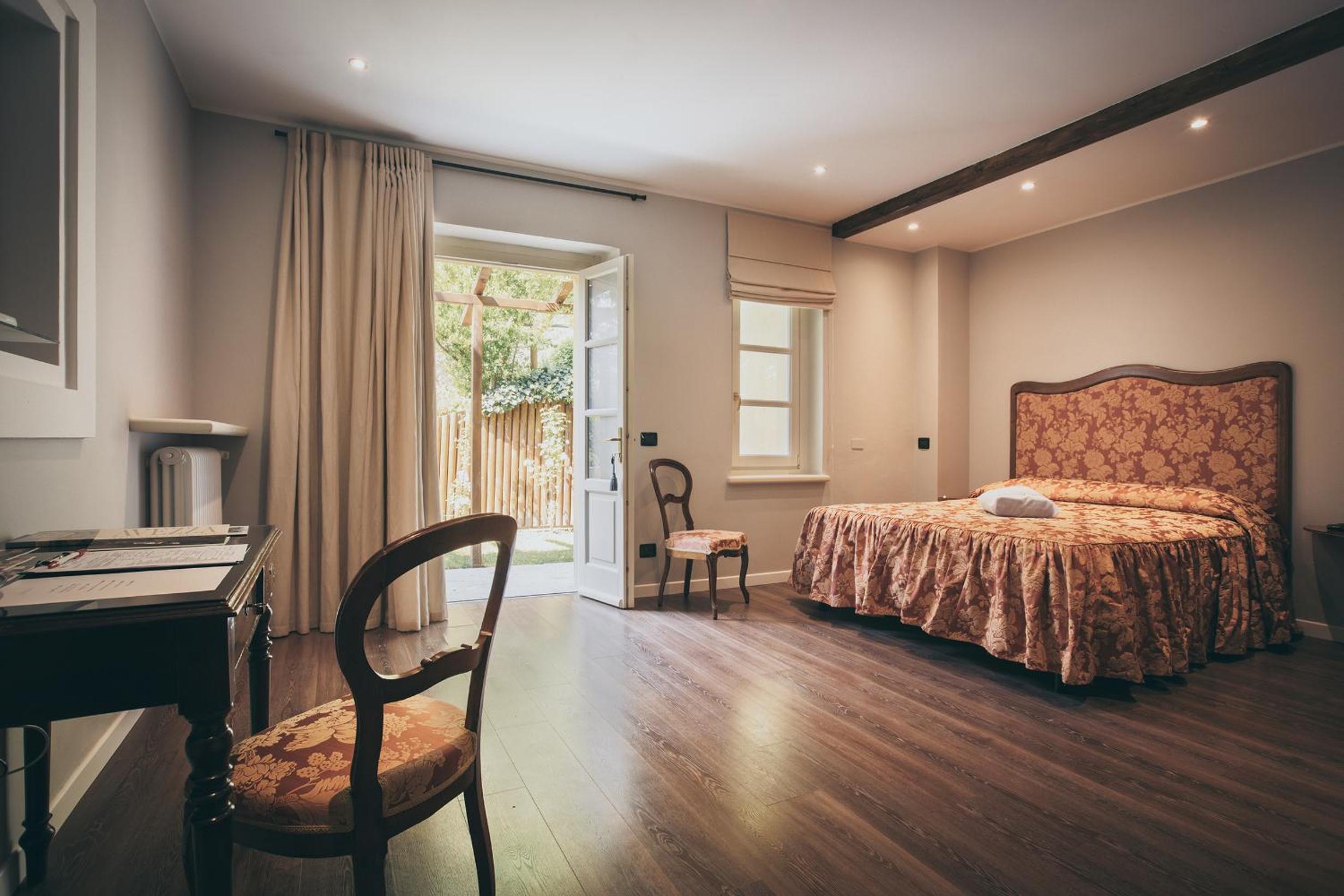 Junior Suite with Garden View - Photo 1
