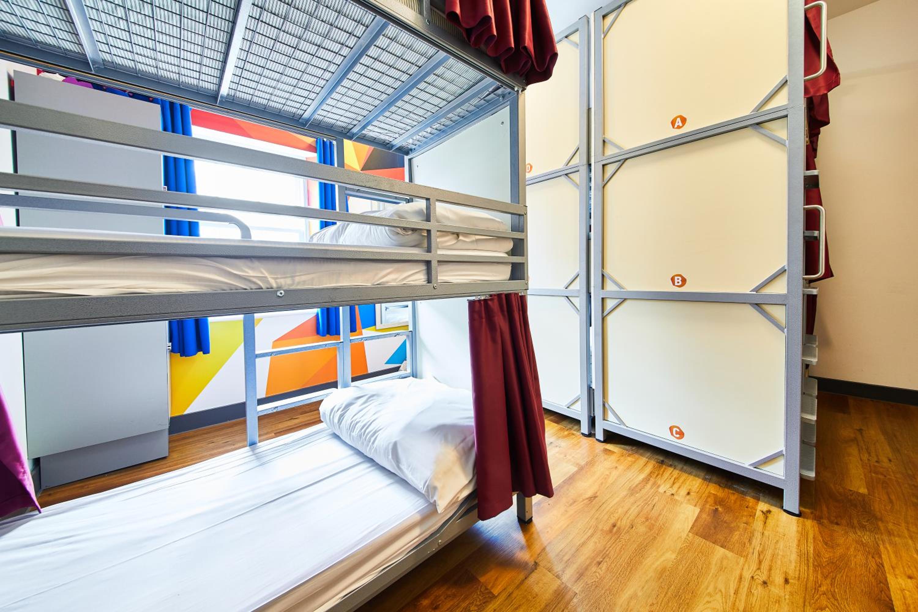 Bed in 9-Bed Mixed Dormitory Room with Triple Bunks and  External Shared Bathroom  photo 1
