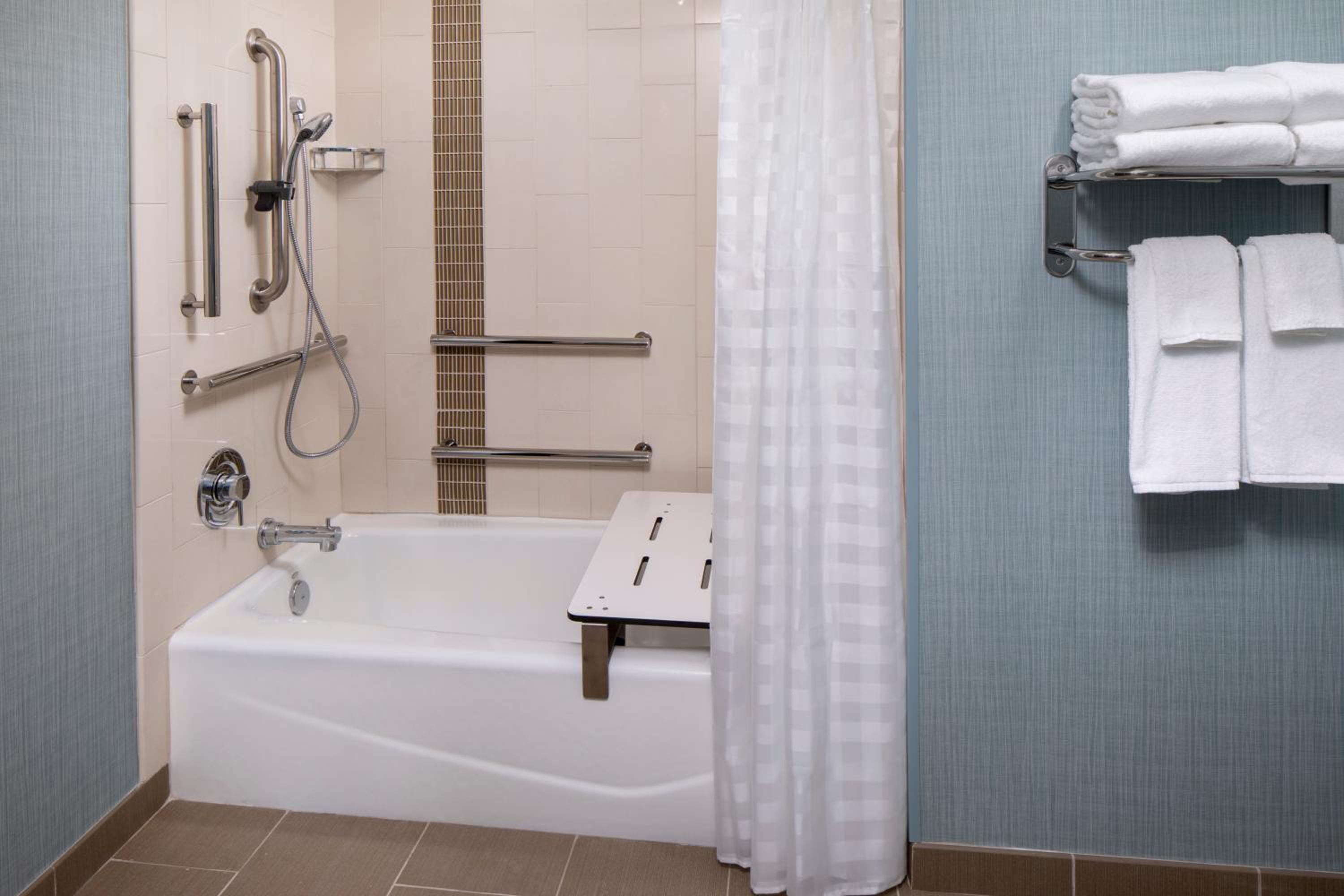 Queen Room with Two Queen Beds with Sofa Bed and Shower - Disability Access