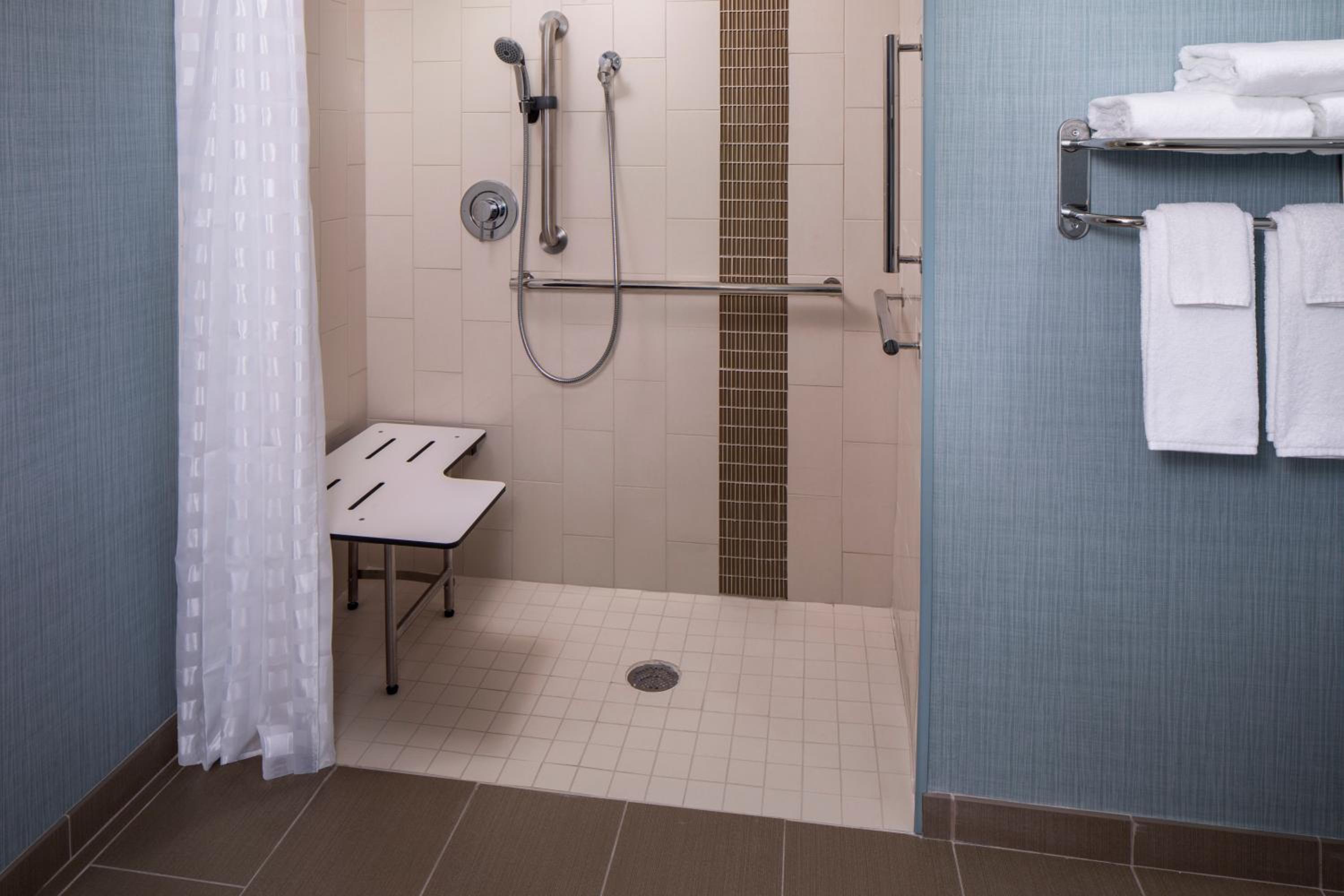 Queen Room with Two Queen Beds with Sofa Bed and Shower - Disability Access