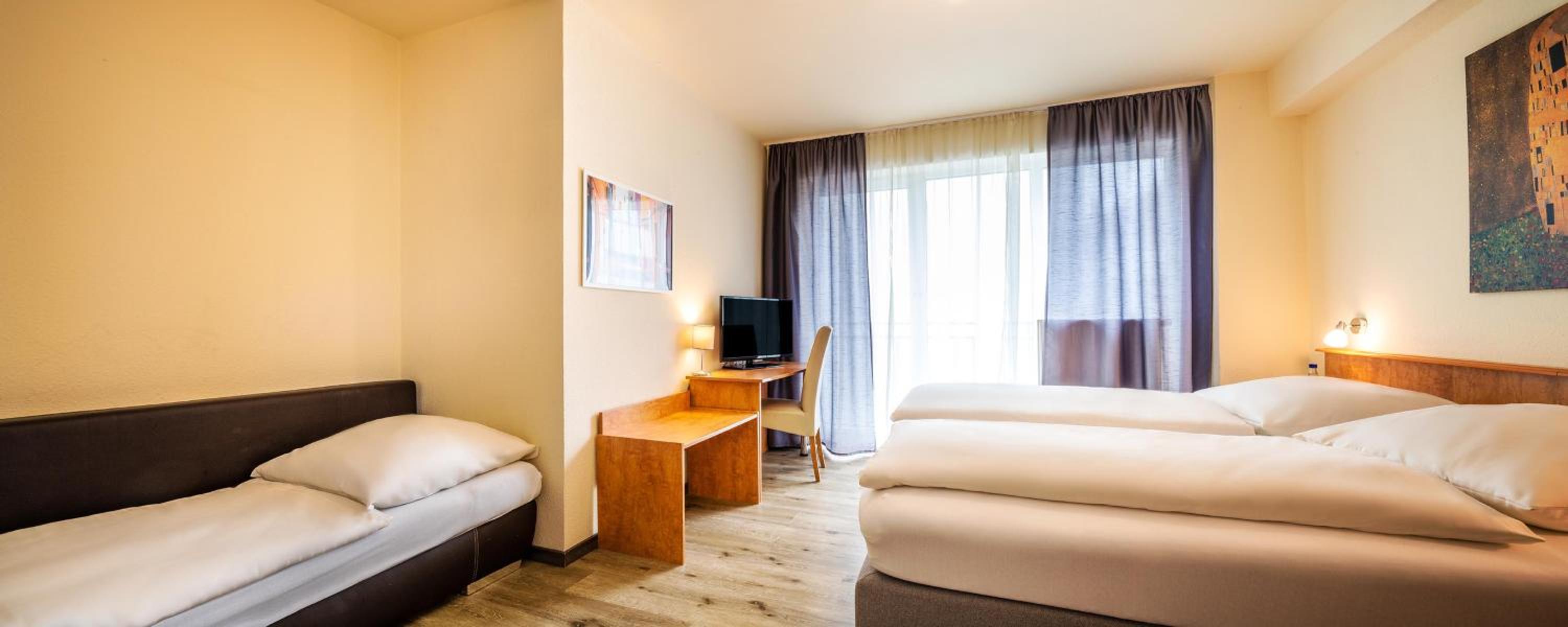 Standard Triple Room - Photo 7
