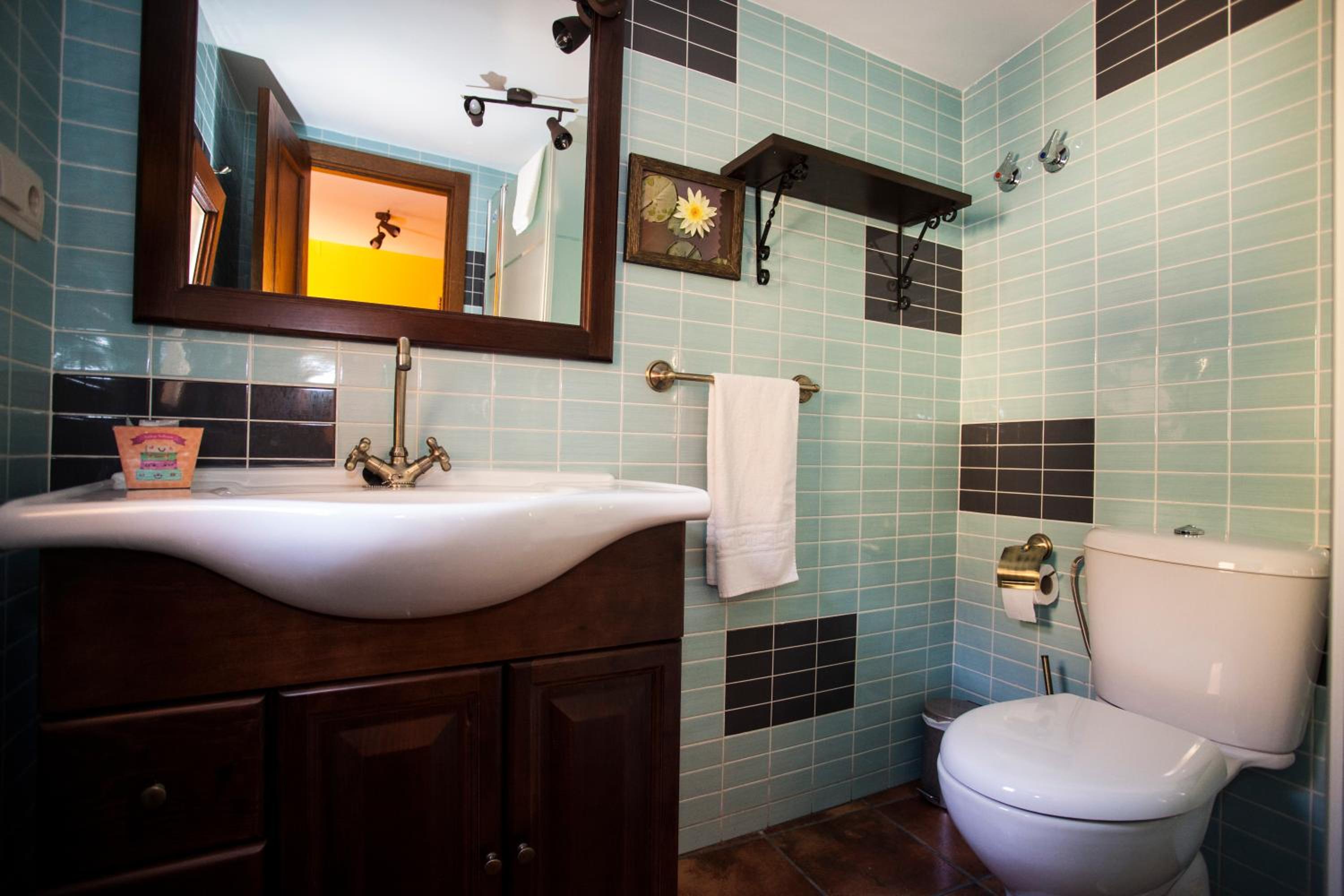 Three-Bedroom House - Photo 28