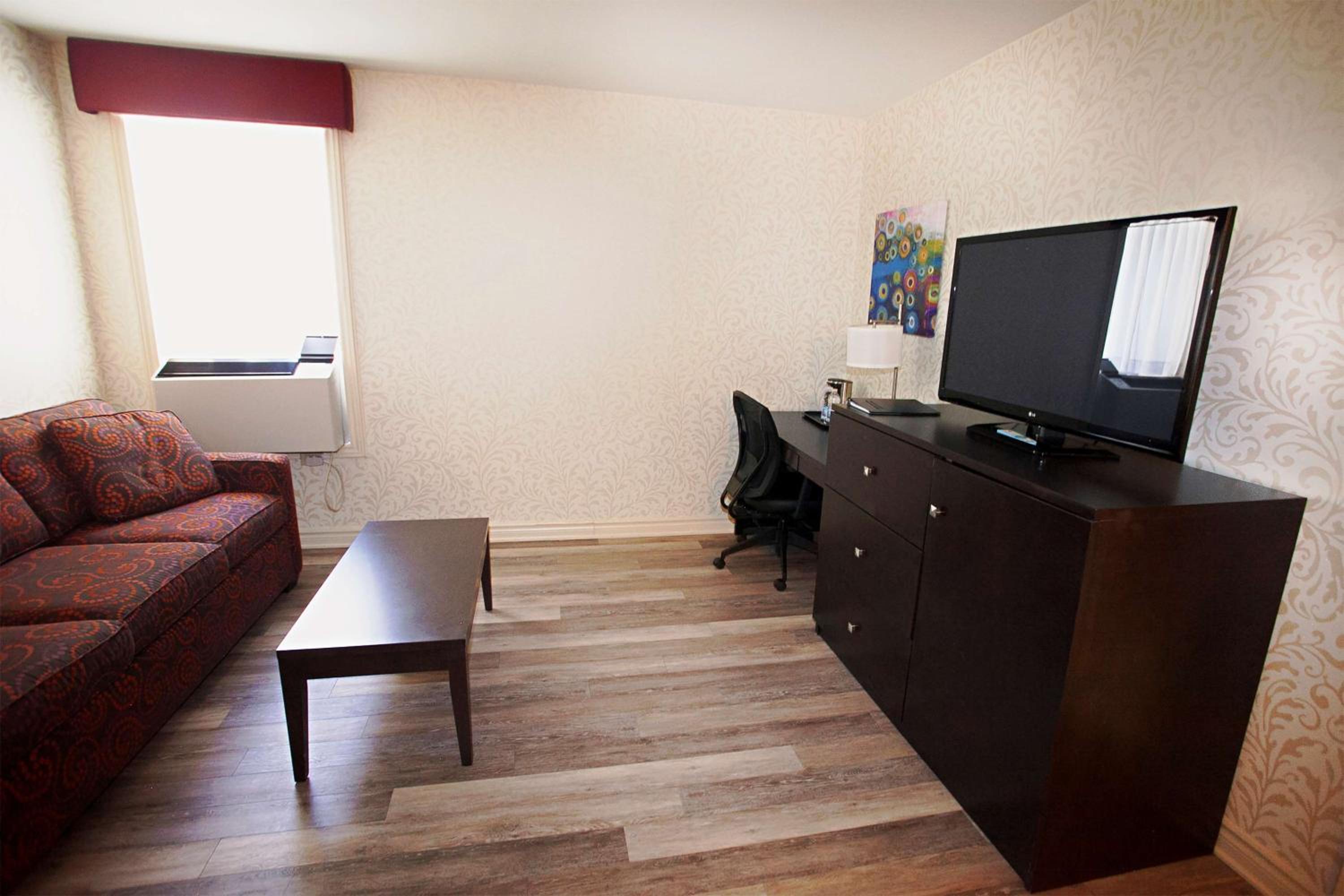 King Room with Queen Sofa Bed - Photo 1