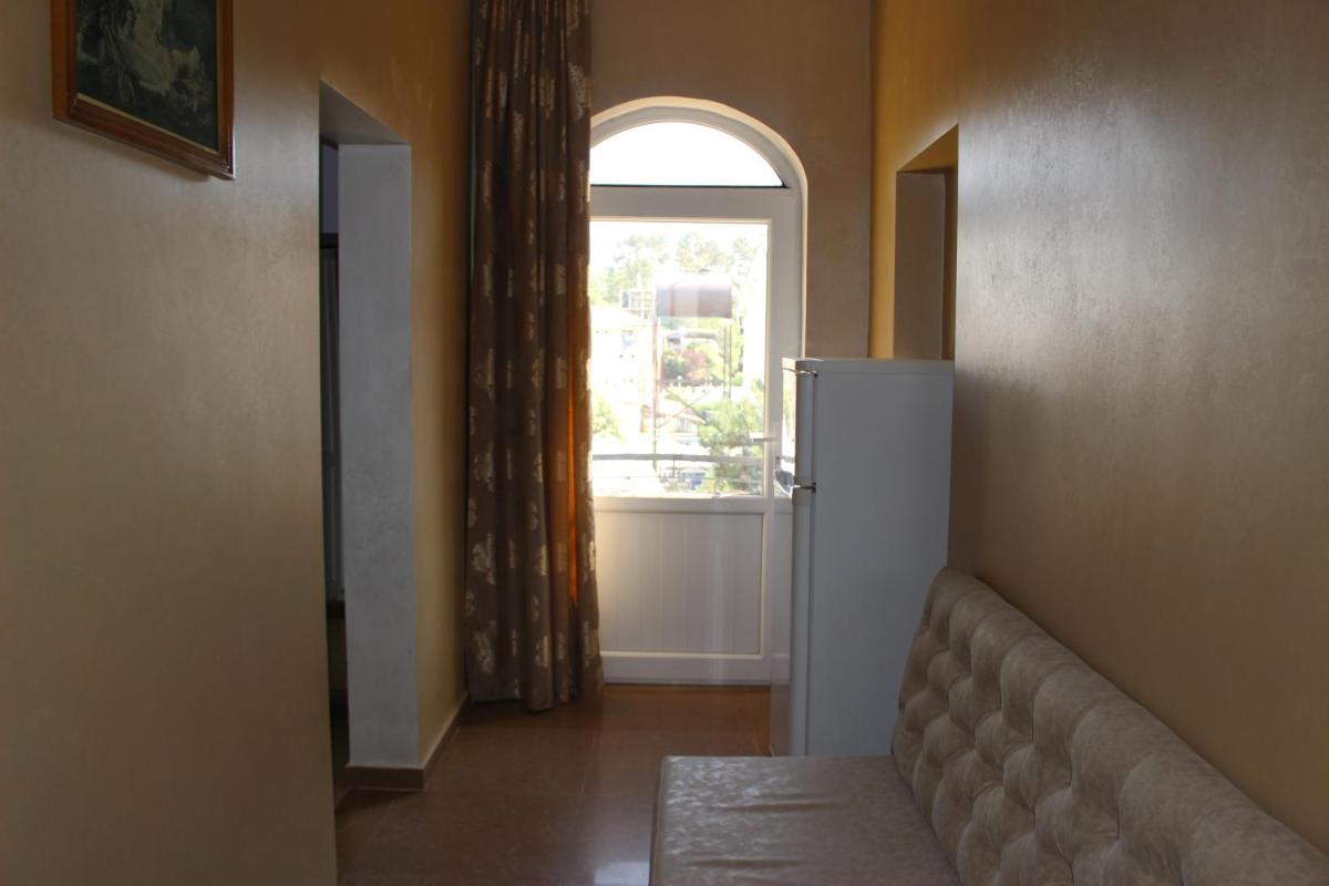 Quadruple Room with Balcony photo 2