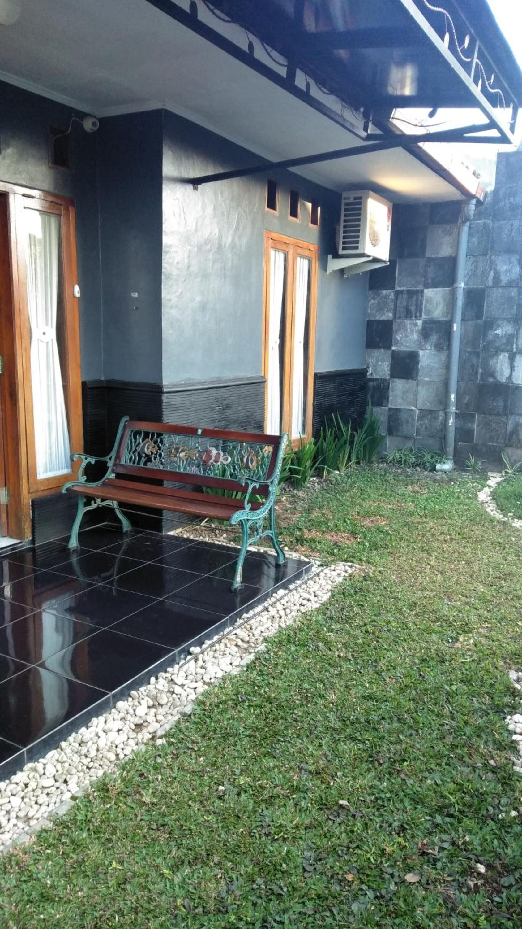 Three-Bedroom House - Photo 12