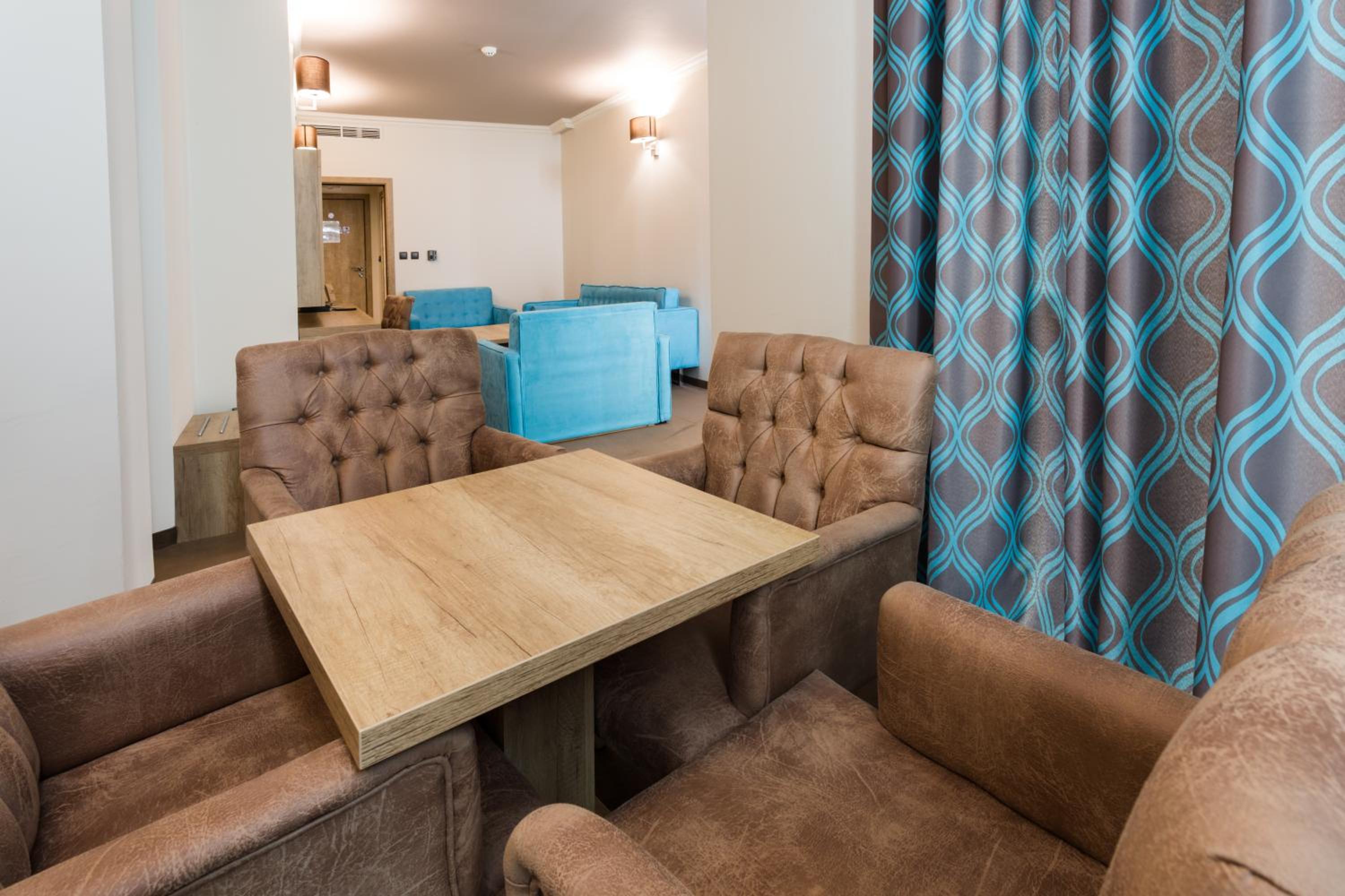 One-Bedroom Suite with Balcony and Sea View (2 Adults + 2 Children)