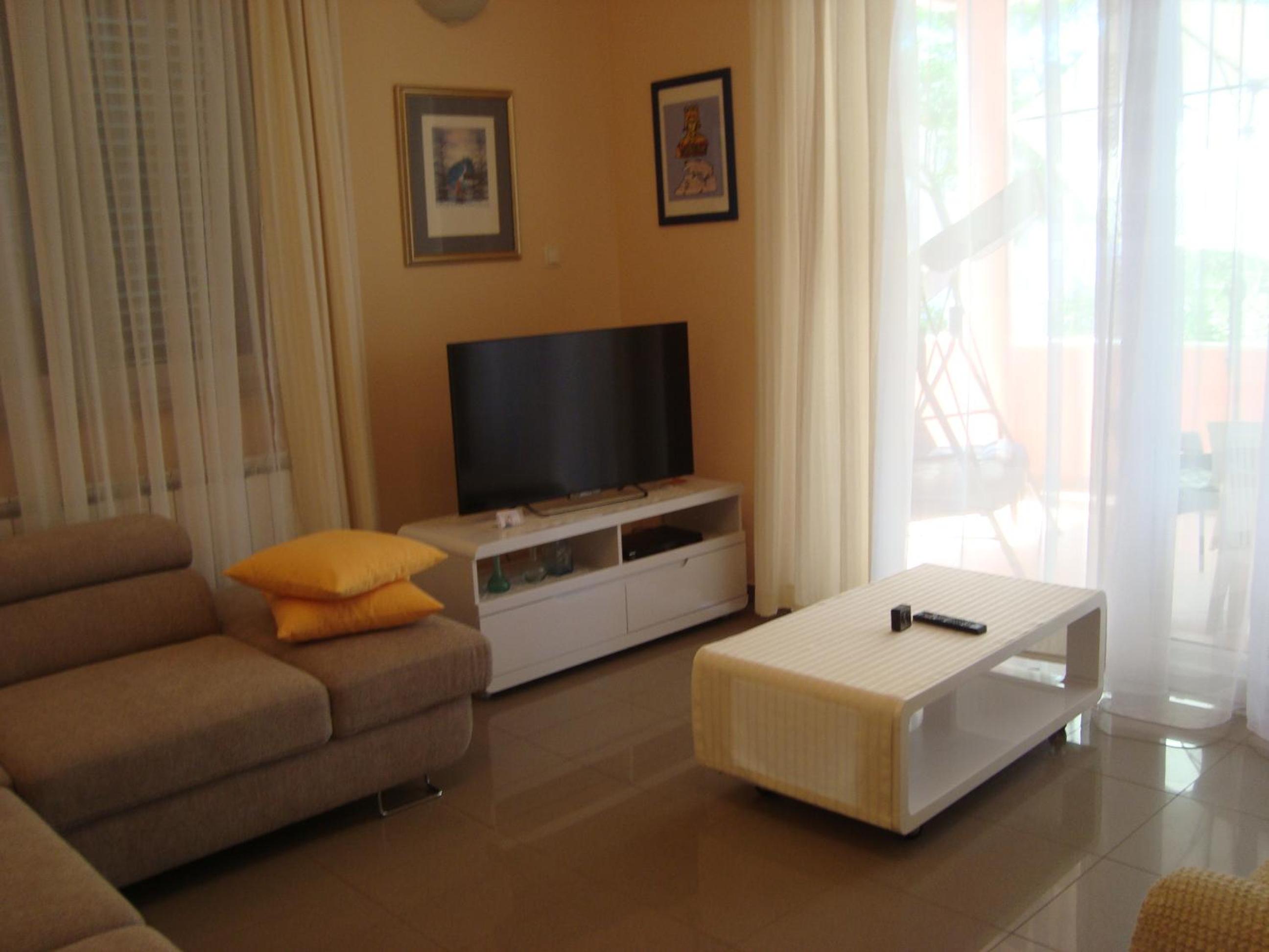 Three-Bedroom Apartment with Terrace and Sea View