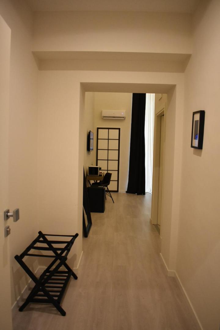 Deluxe Double Room with Balcony - Photo 16