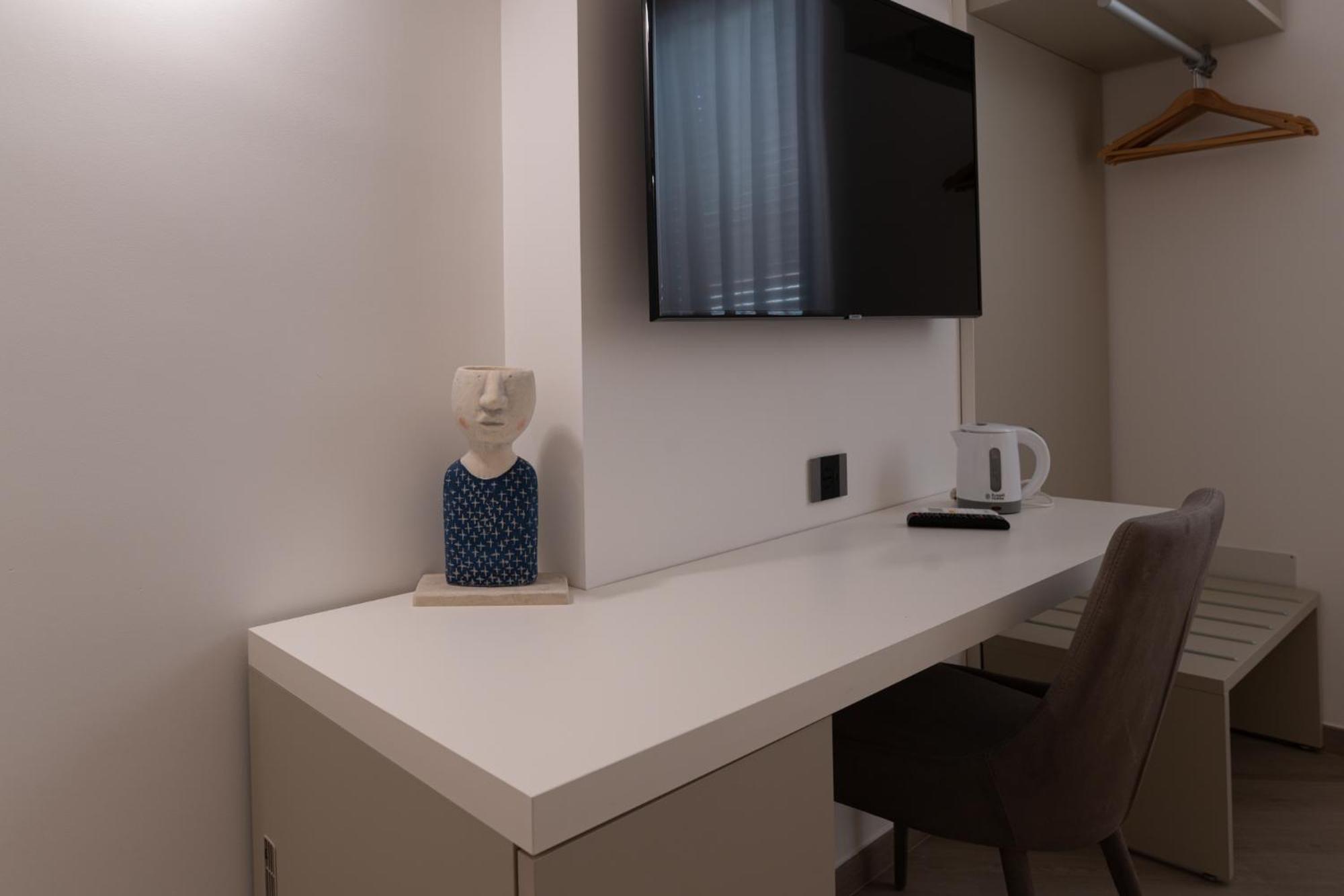 Deluxe Triple Room - Photo 15