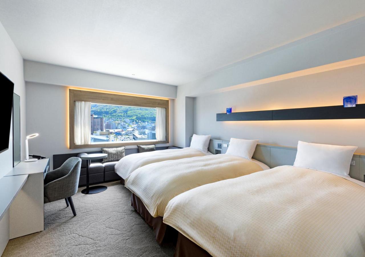 Deluxe Twin Room for 3 adult - Photo 1