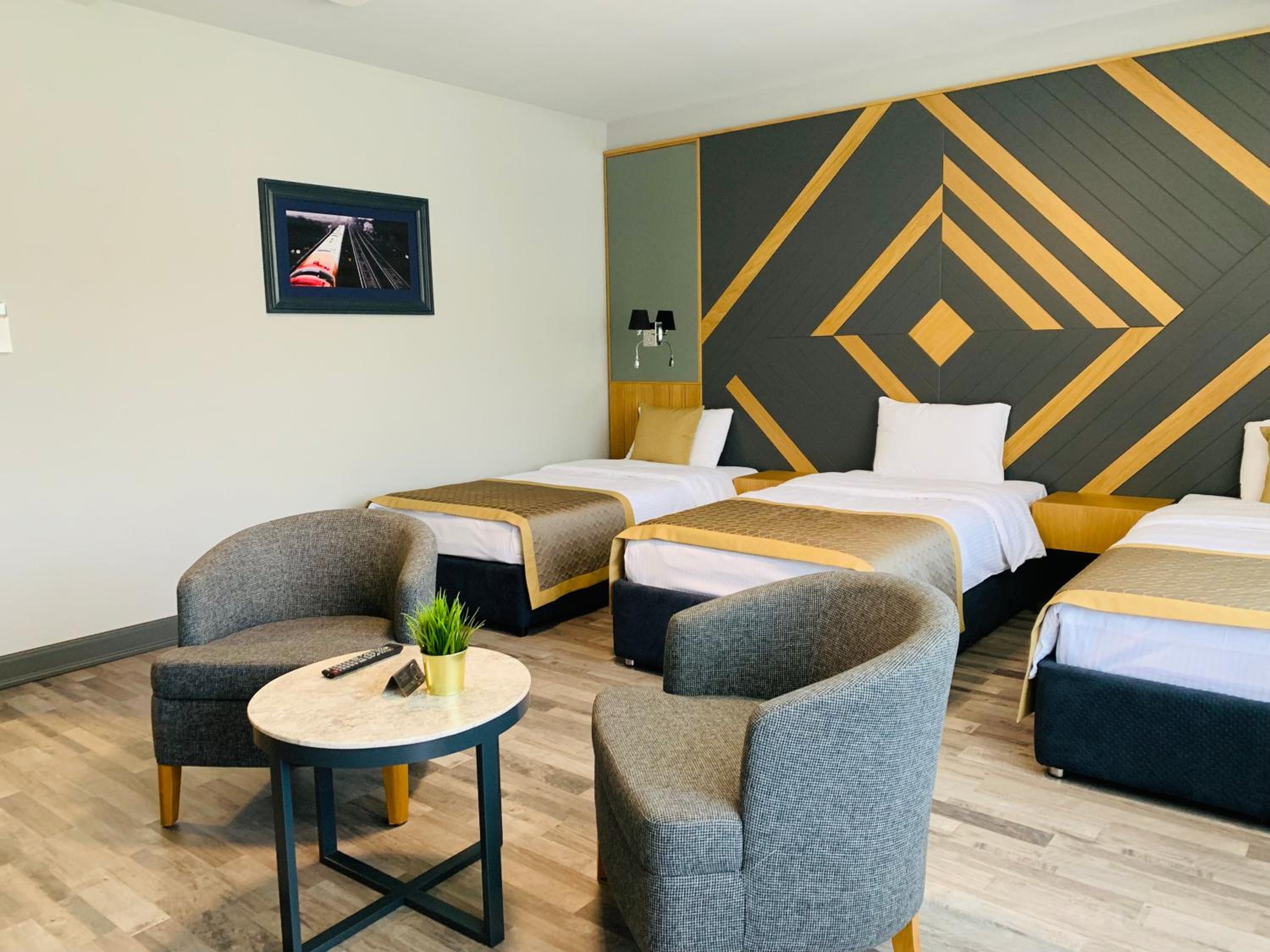 Deluxe Triple Room