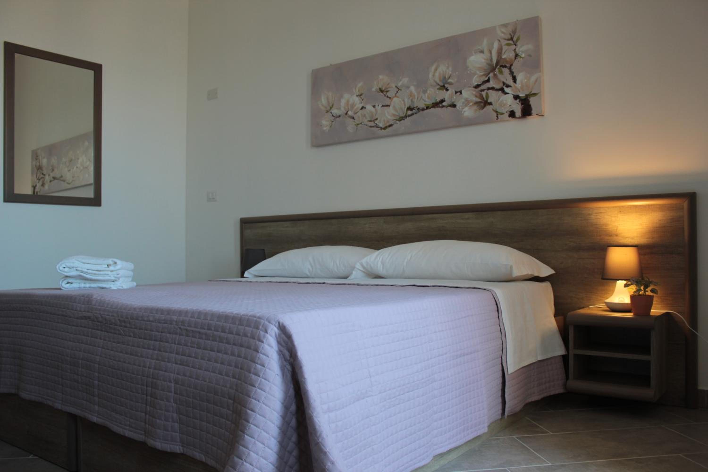 Superior Quadruple Room with Balcony