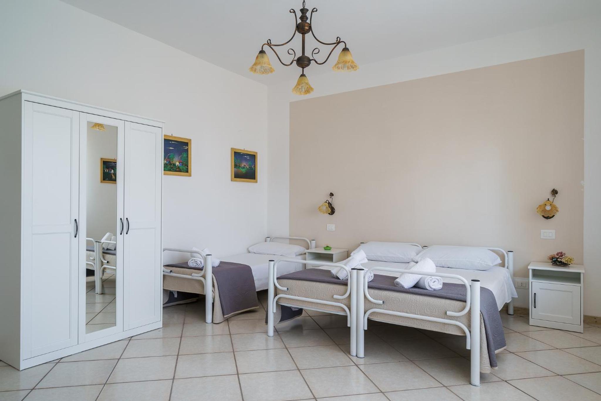 Quadruple Room - Photo 7
