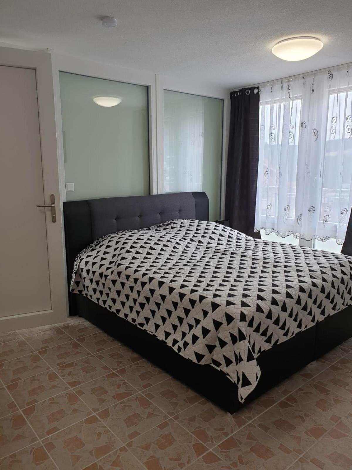 Three-Bedroom Apartment photo 1