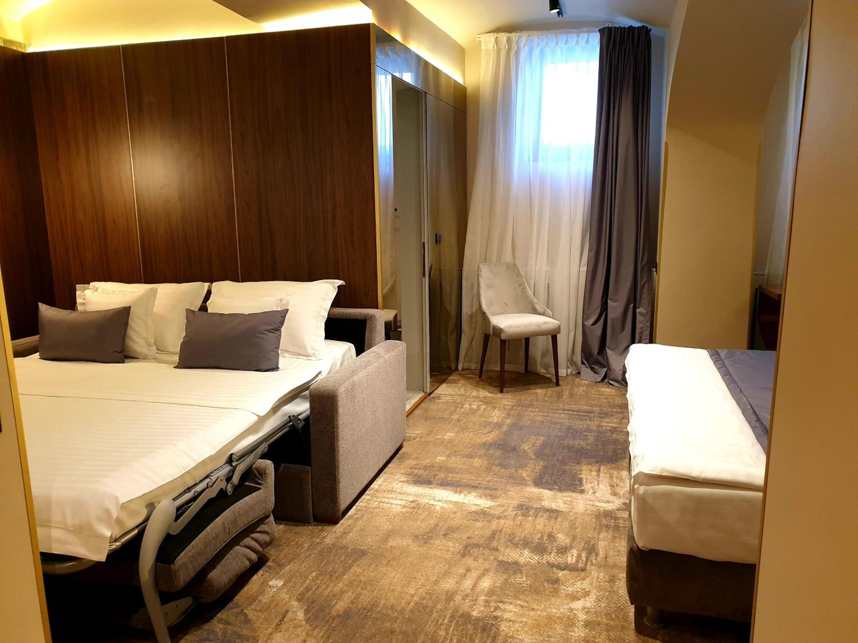 Standard Quadruple Room - Photo 7