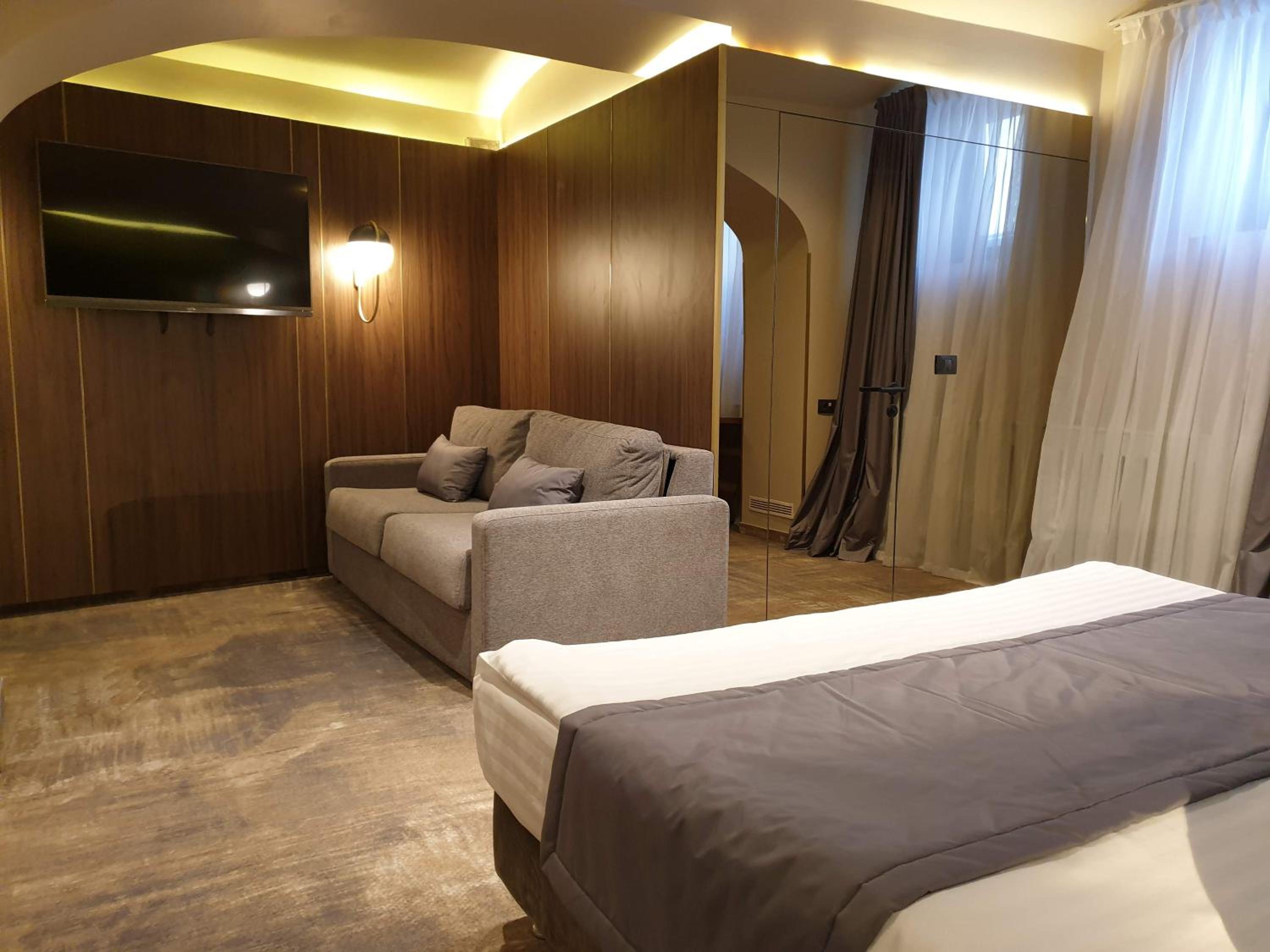 Standard Quadruple Room - Photo 12