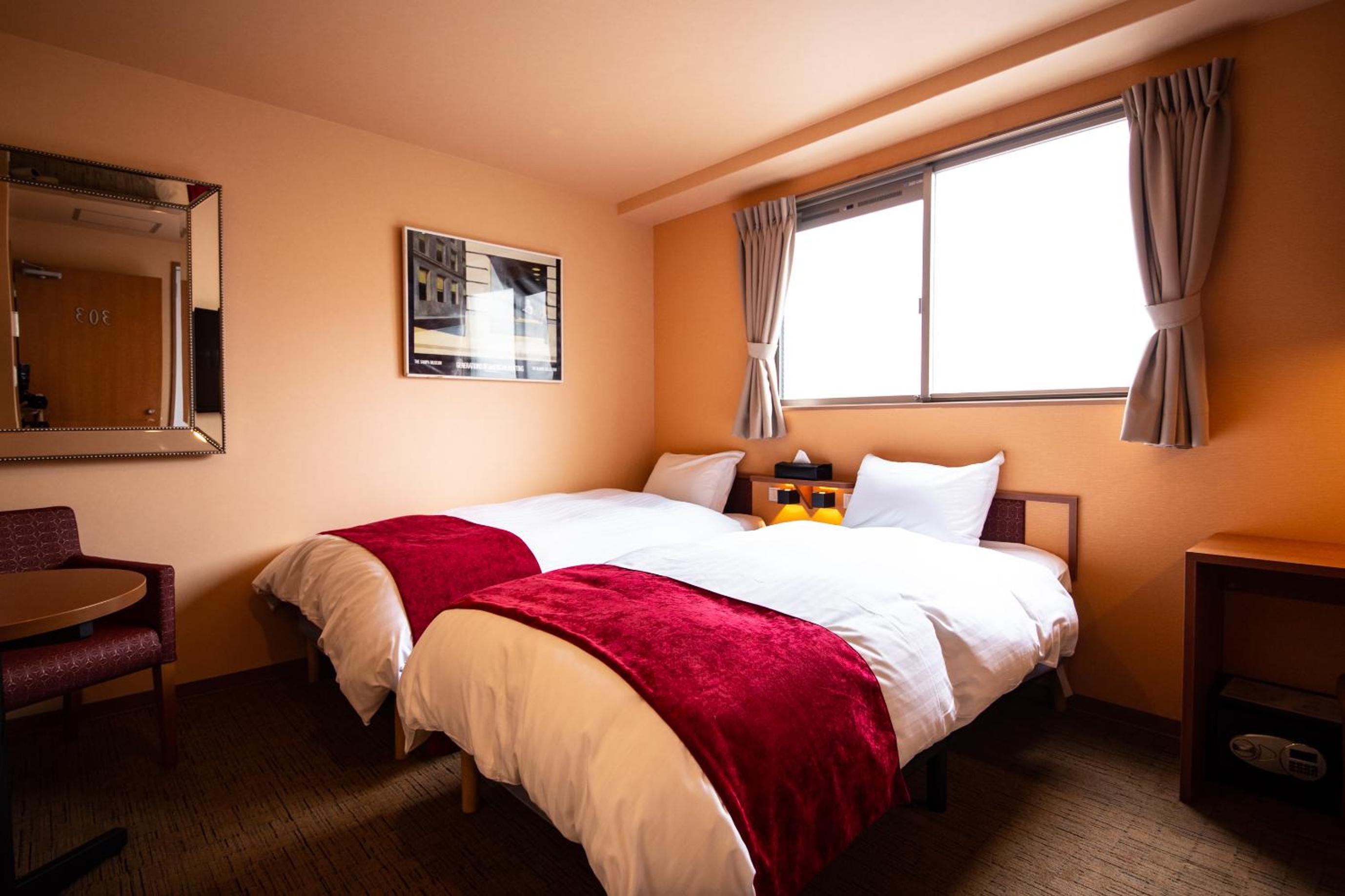 Standard Twin Room - Photo 7