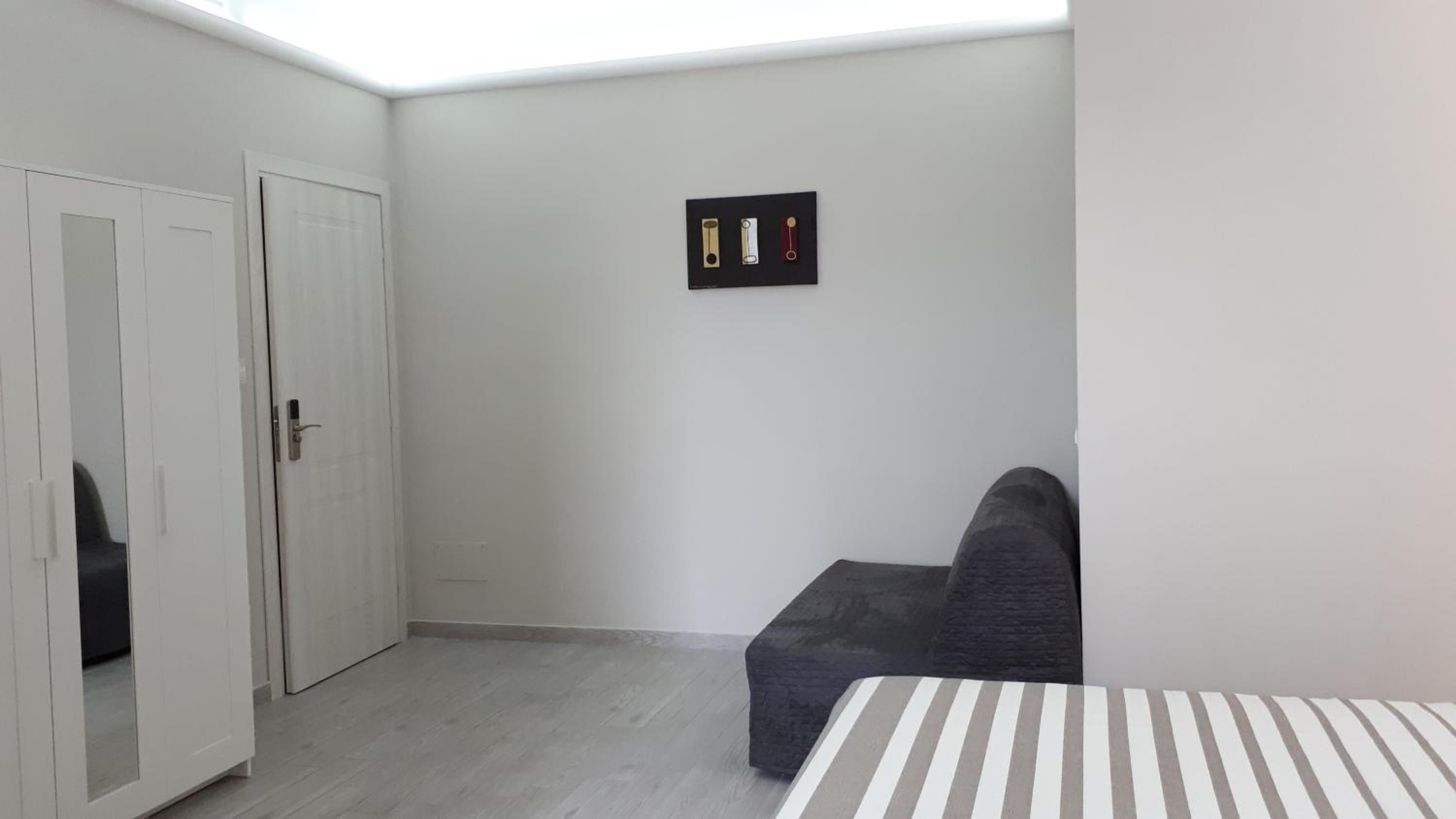 Quadruple Room with Private Bathroom photo 2