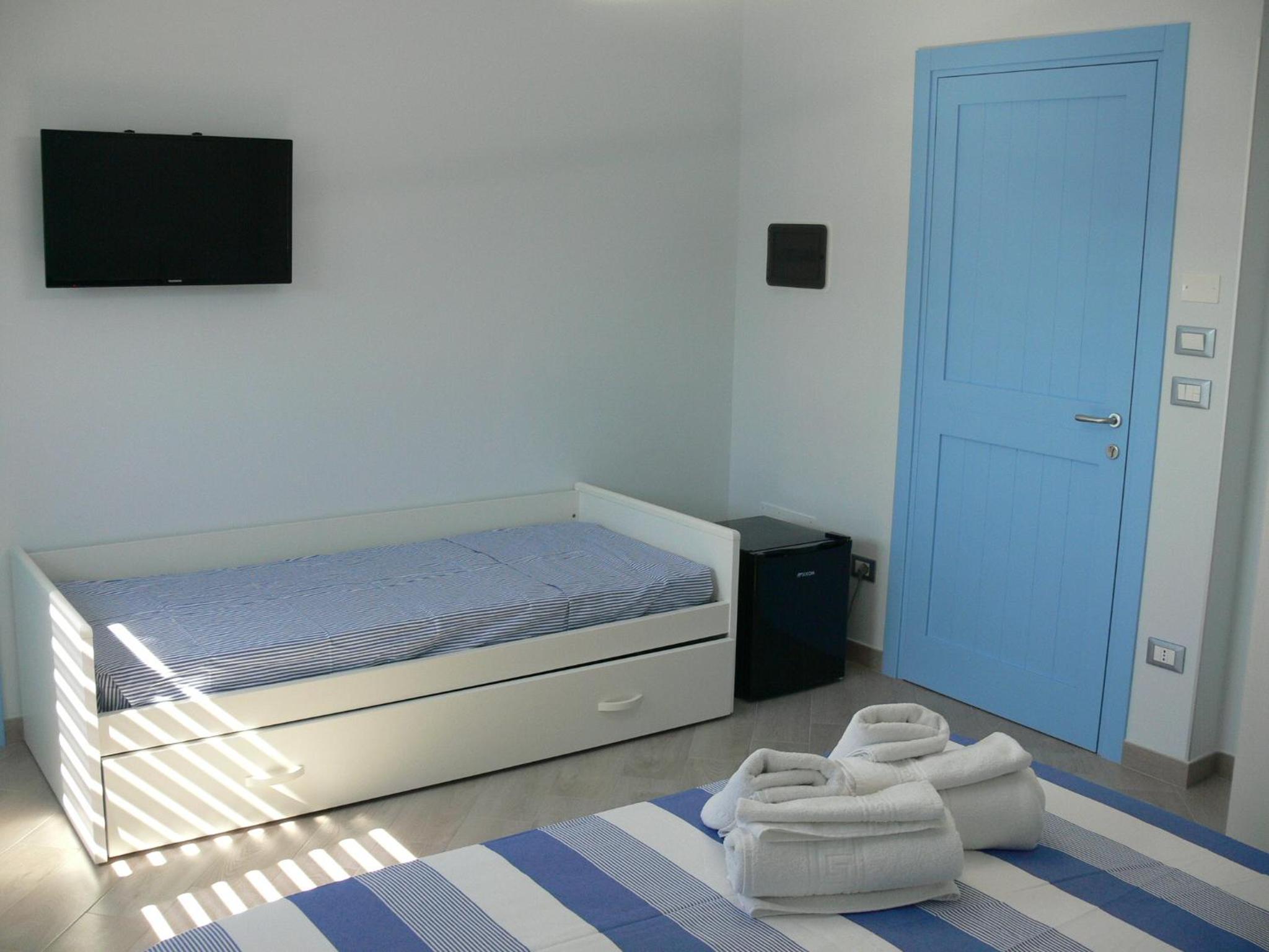 Quadruple Room with Private Bathroom photo 3