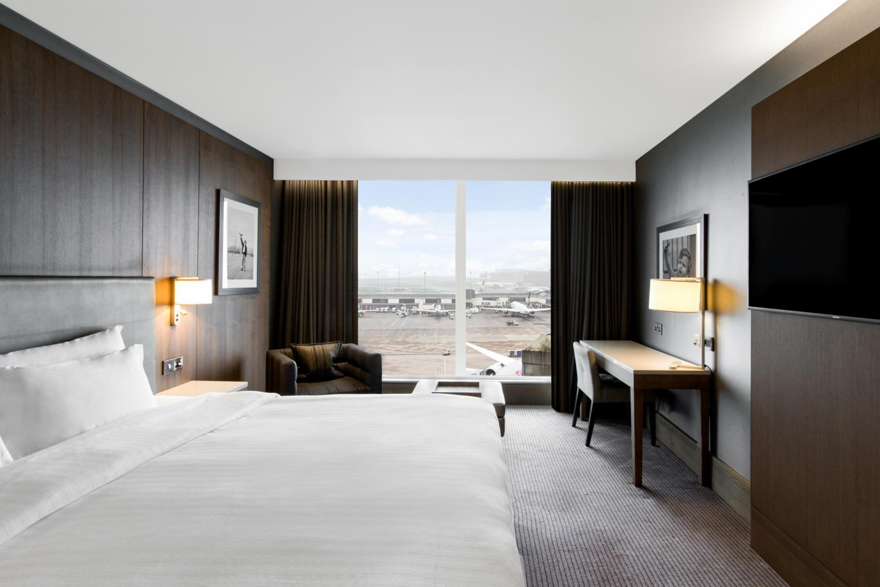 Premium Room with Runway View - Photo 1