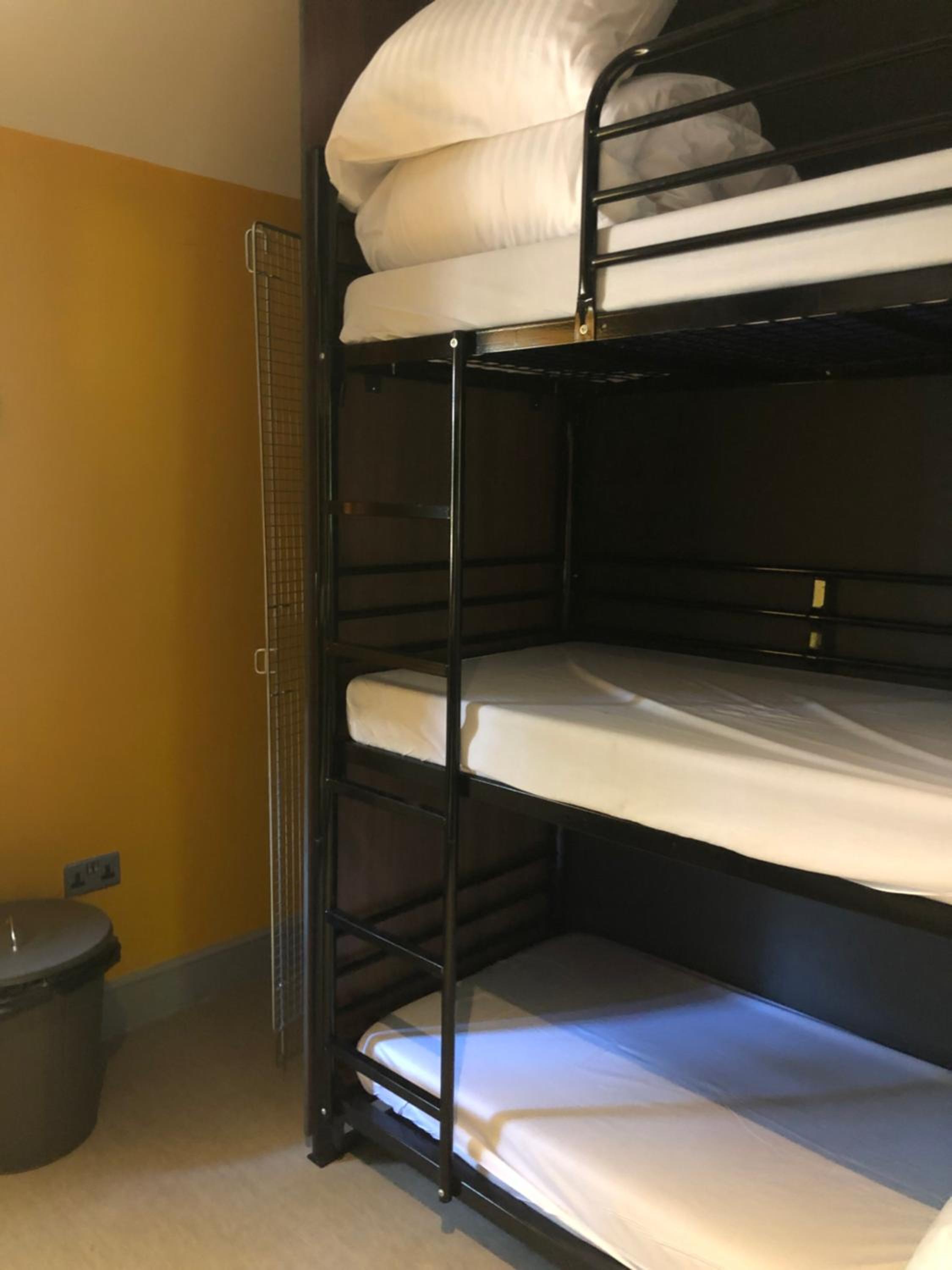 Bed in 9-Bed Mixed Dormitory Room with Shared Bathroom photo 1
