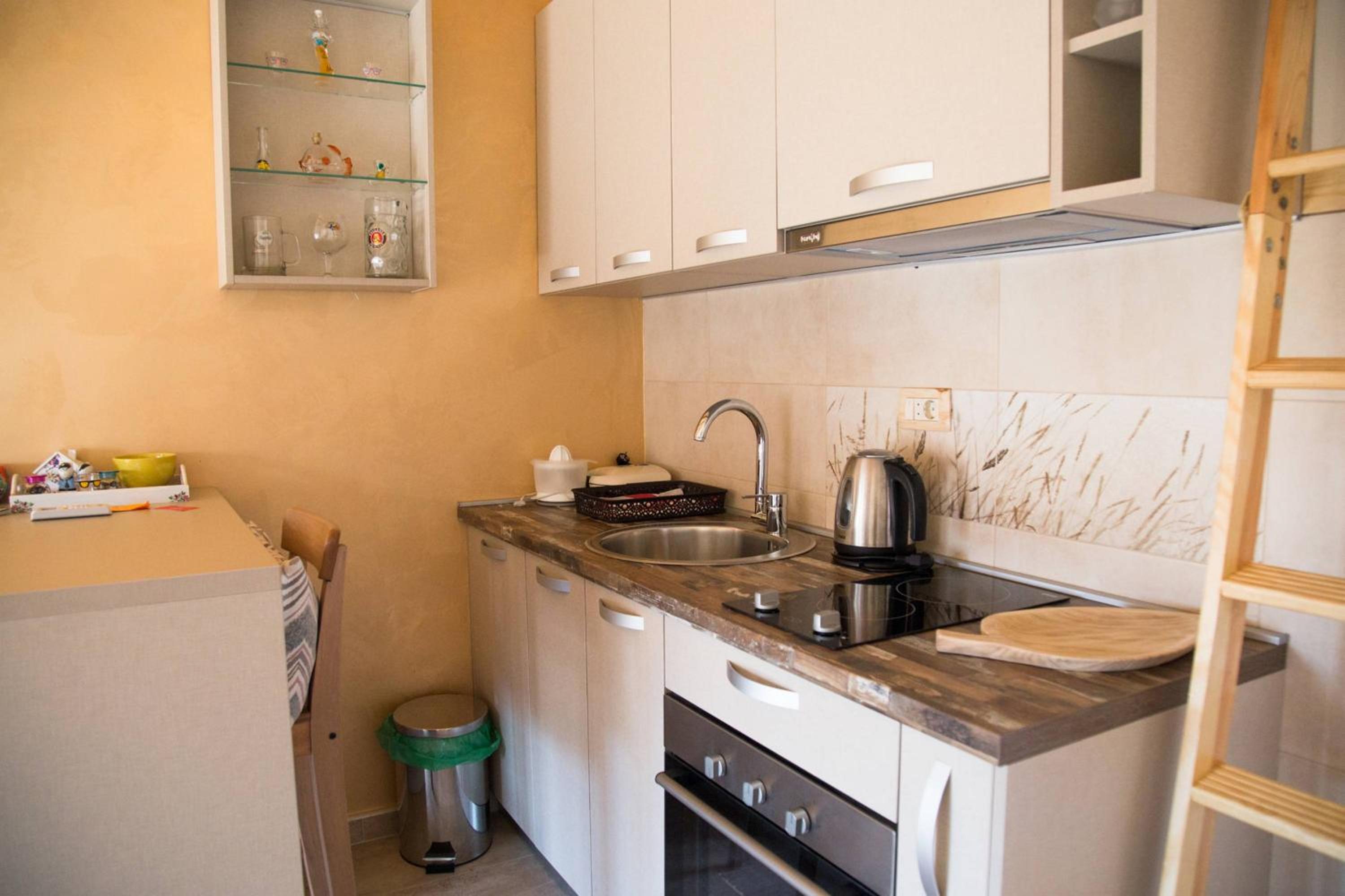 Apartment with Balcony - Photo 13